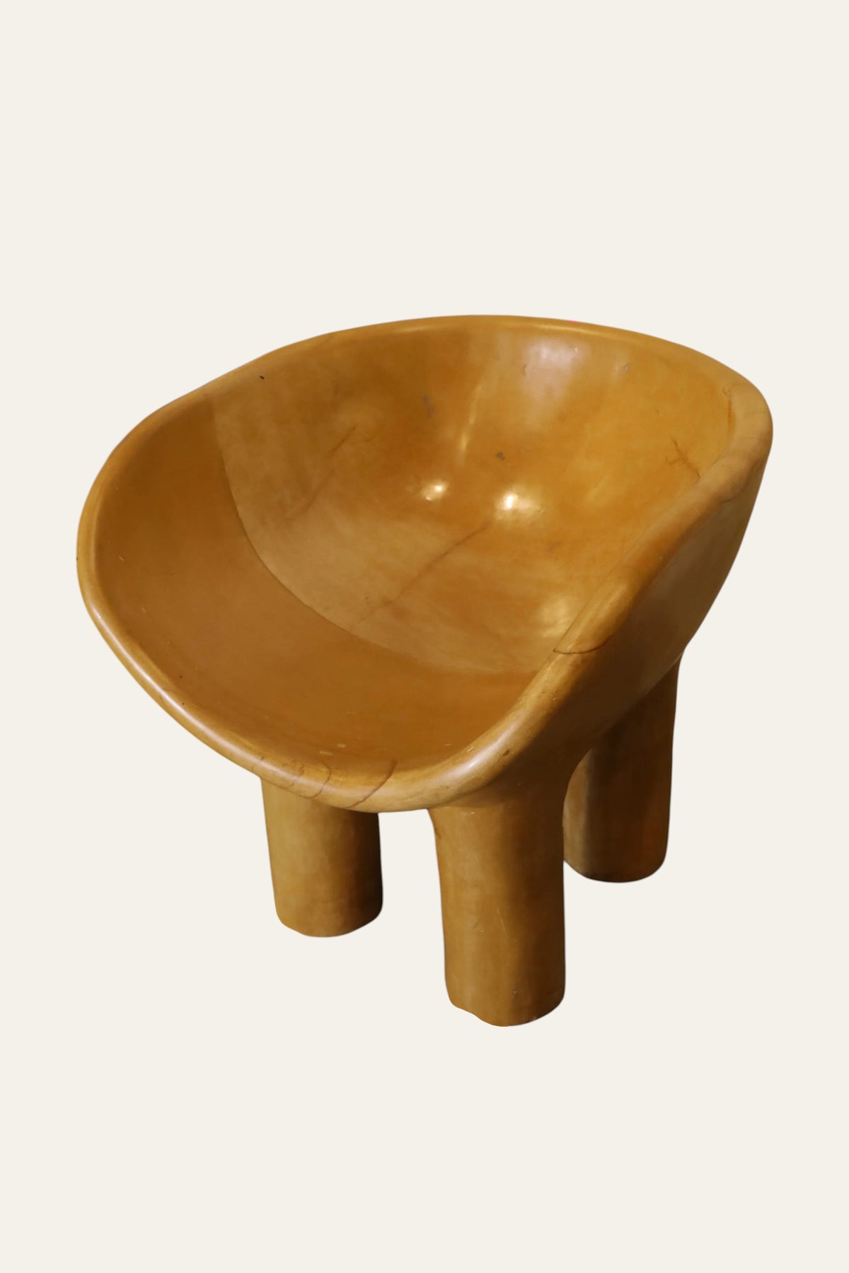 Brown Curved Roly Poly Chair with Chunky Legs