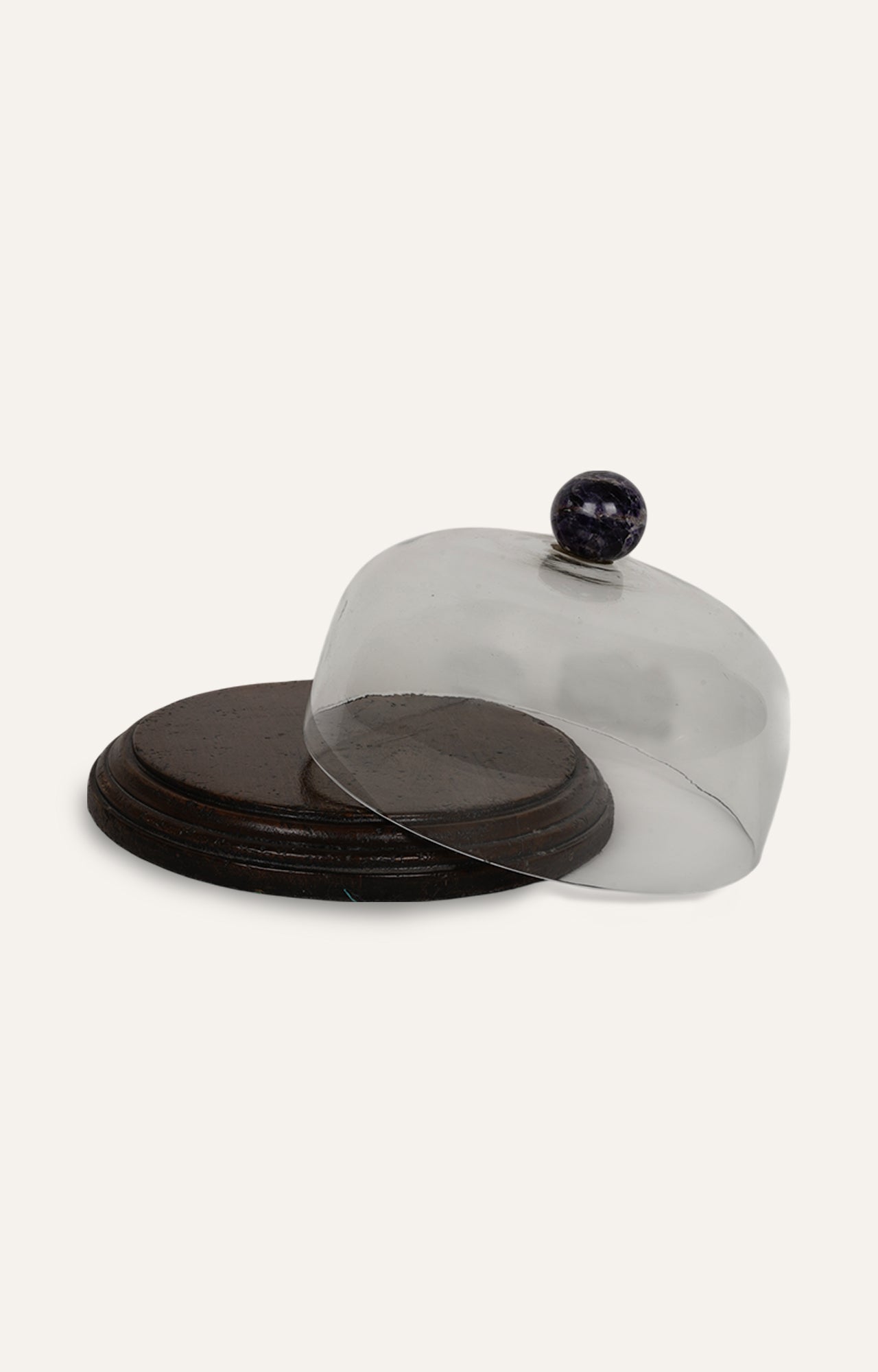 Vintage-style cake cloche with deep purple crystal knob and aged mango wood base.