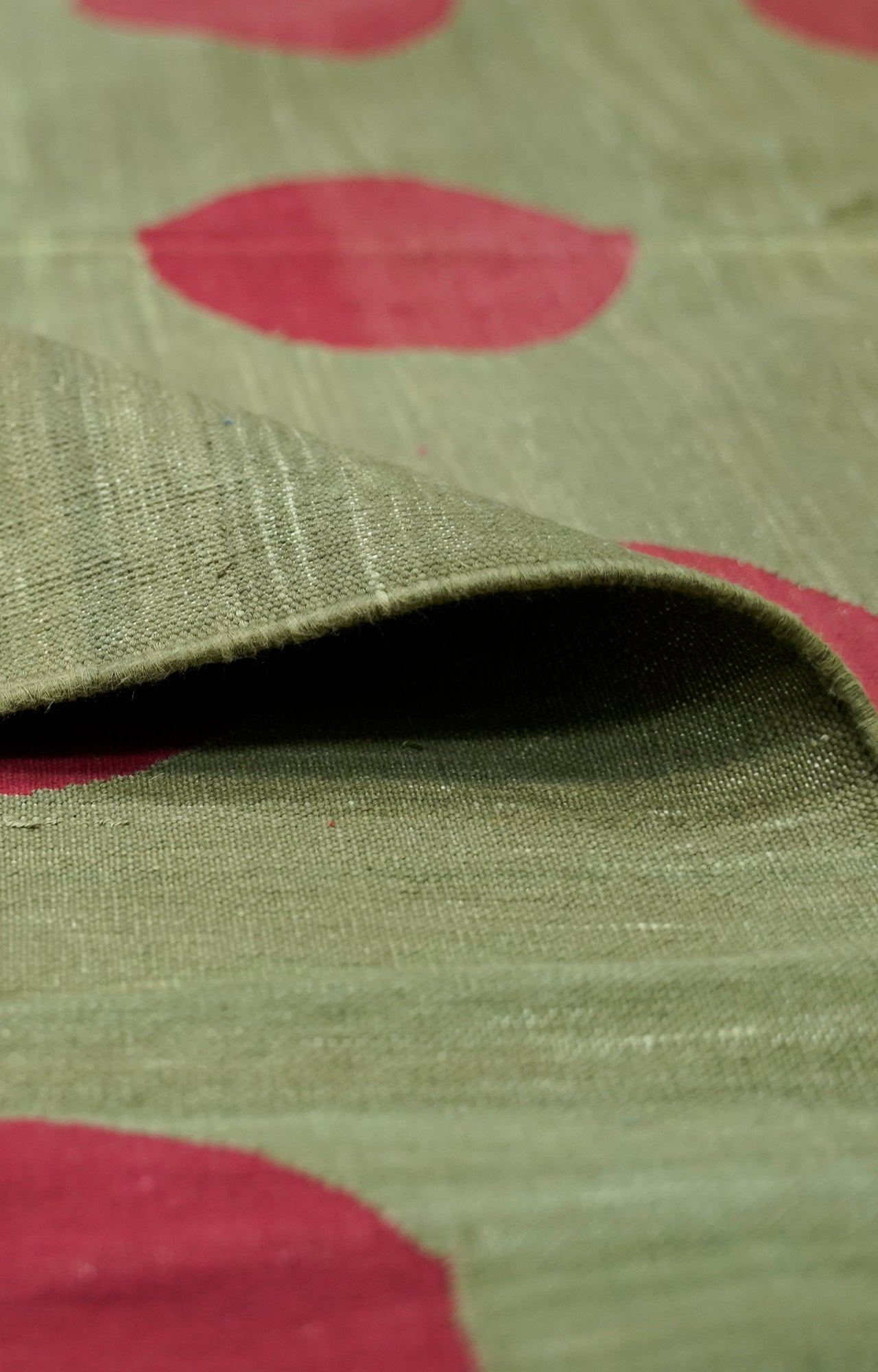 green with red patterns rug