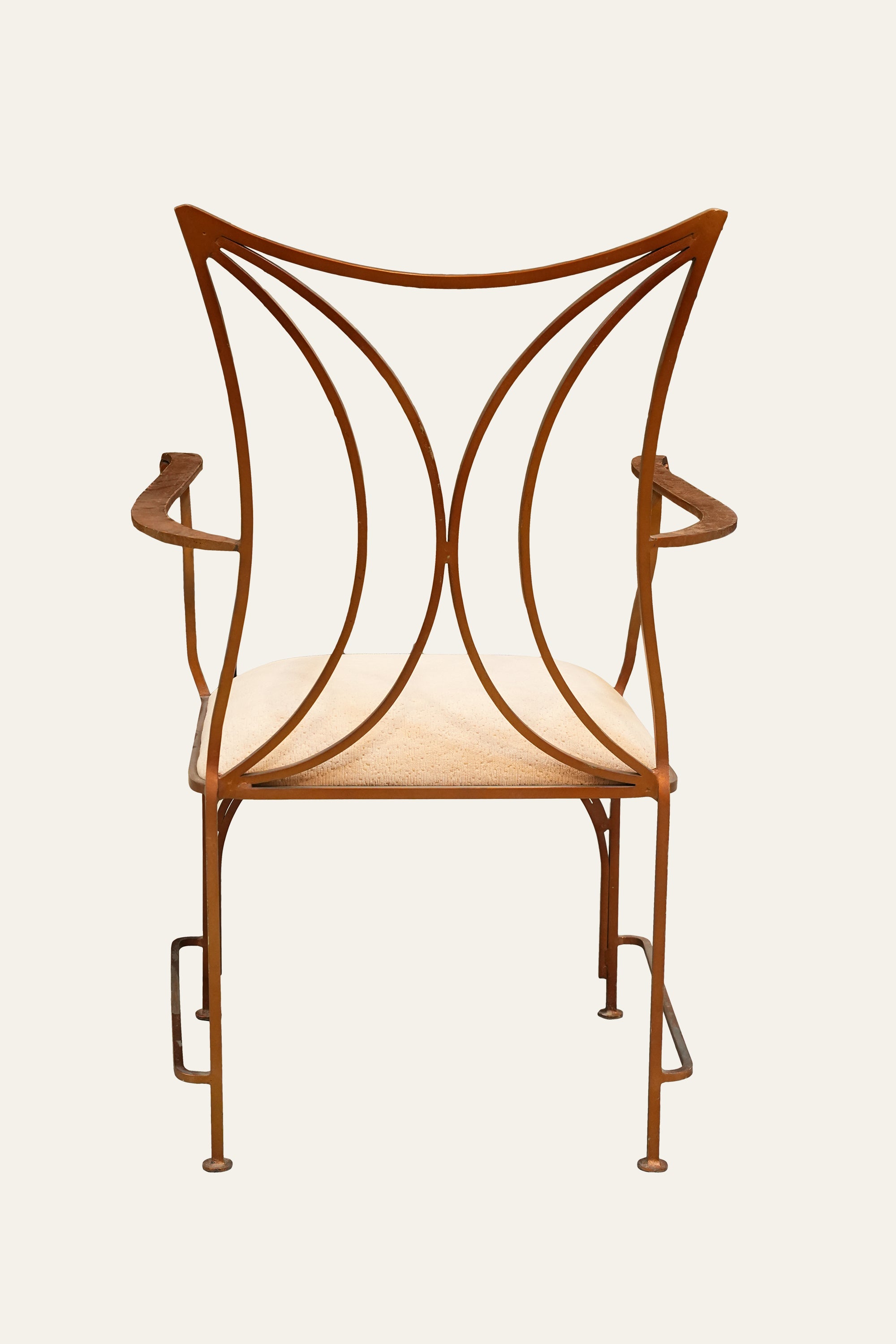 Curved Back Metal Armchair with Plush Cushioned Seat