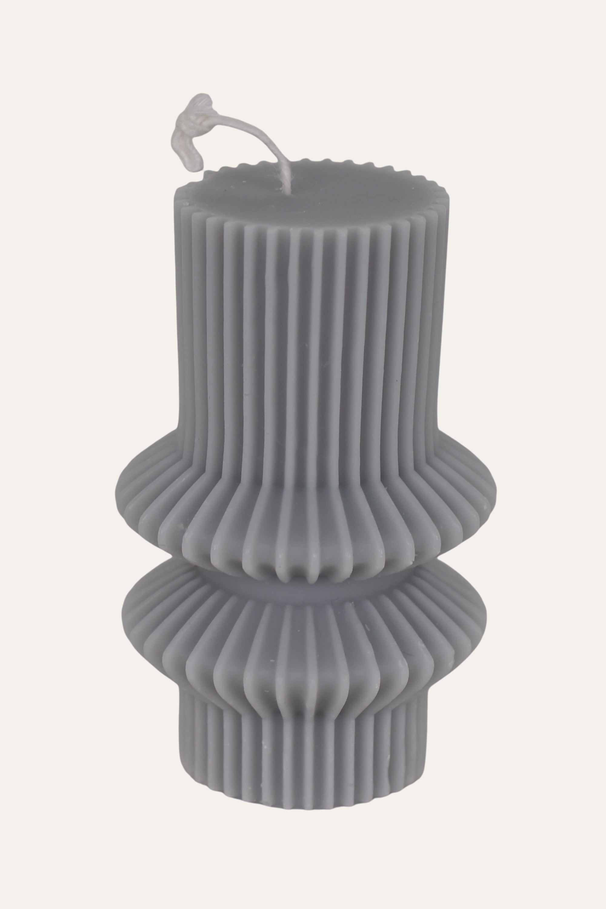 Gray ribbed candle