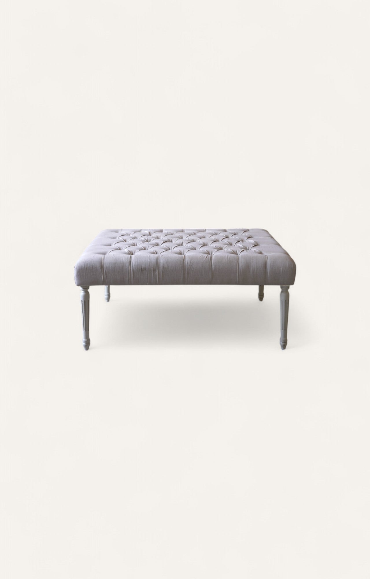 Classic Tufted Ottoman with Turned Wooden Legs