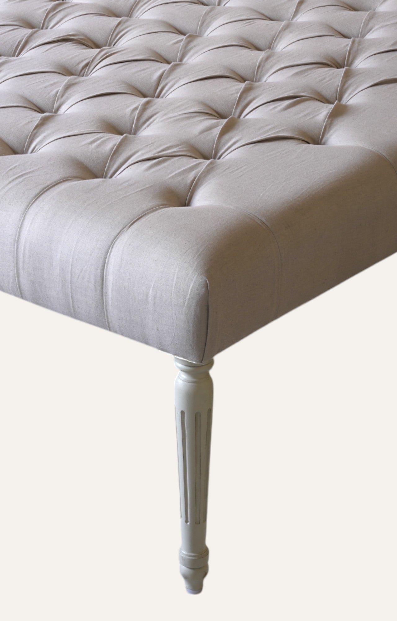 Classic Tufted Ottoman with Turned Wooden Legs