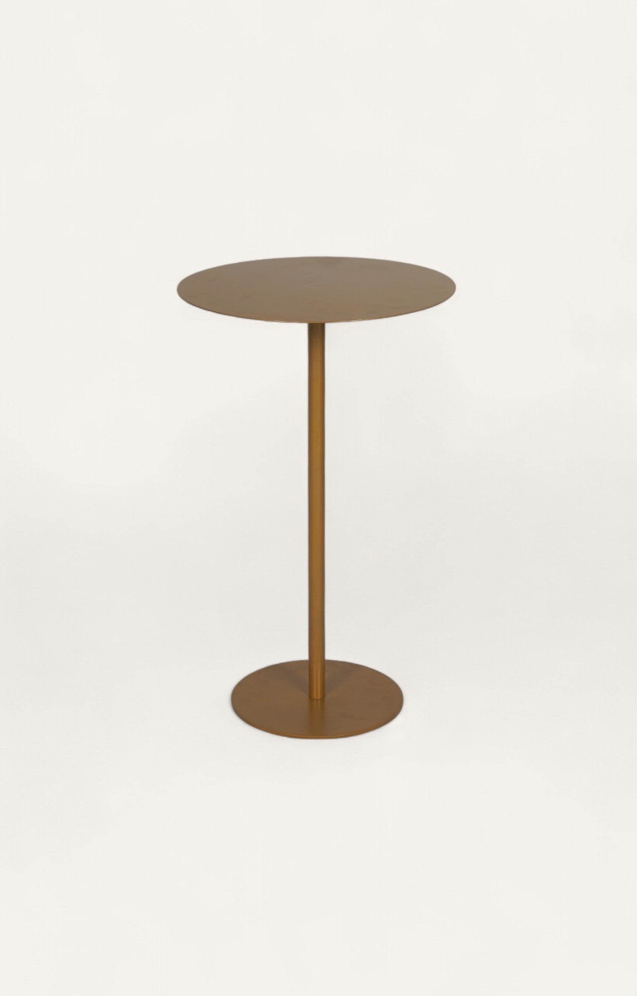 Round-top golden peg table in metal with minimal design.
