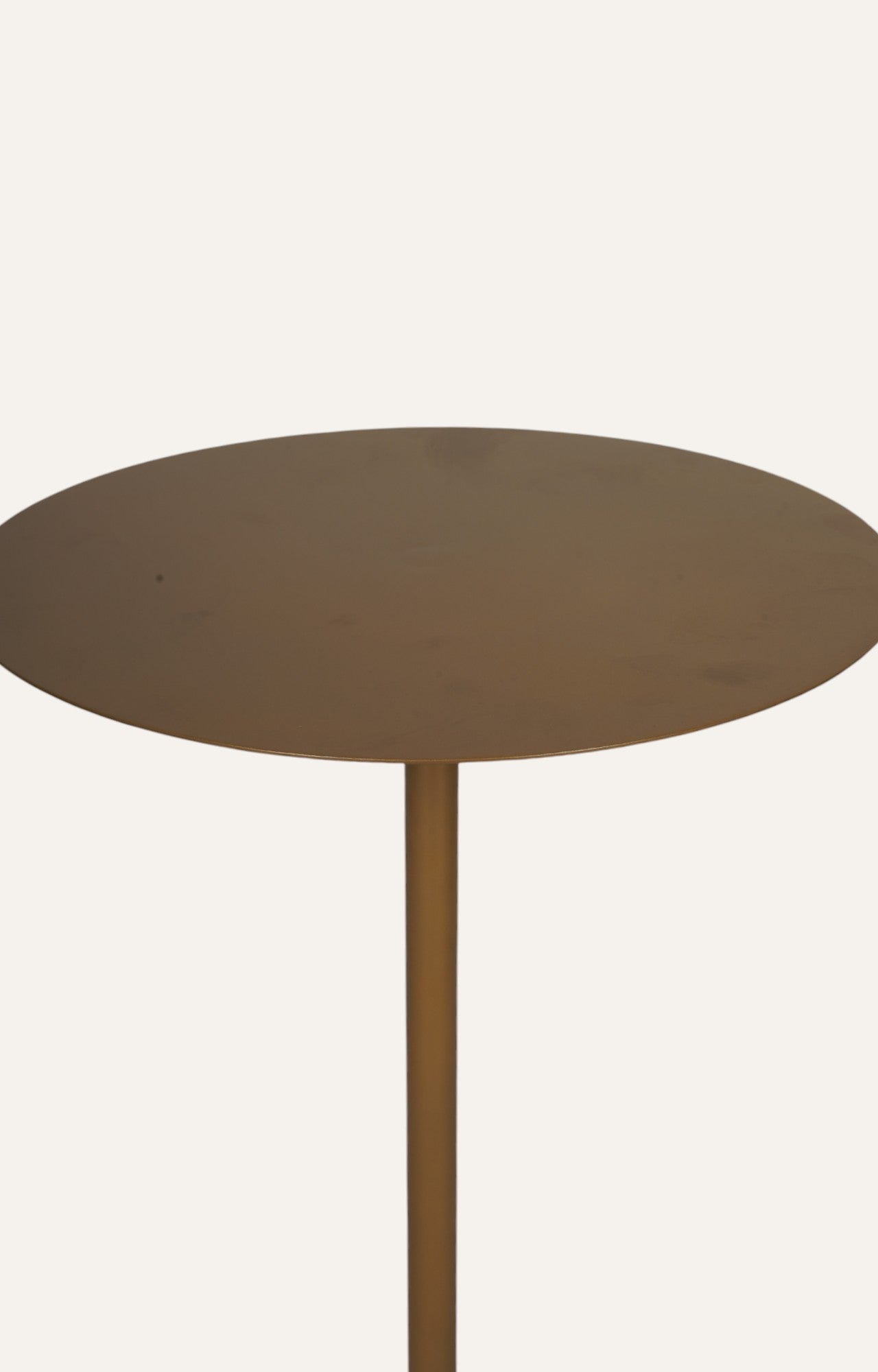 Sleek Golden Circular Accent Peg Table