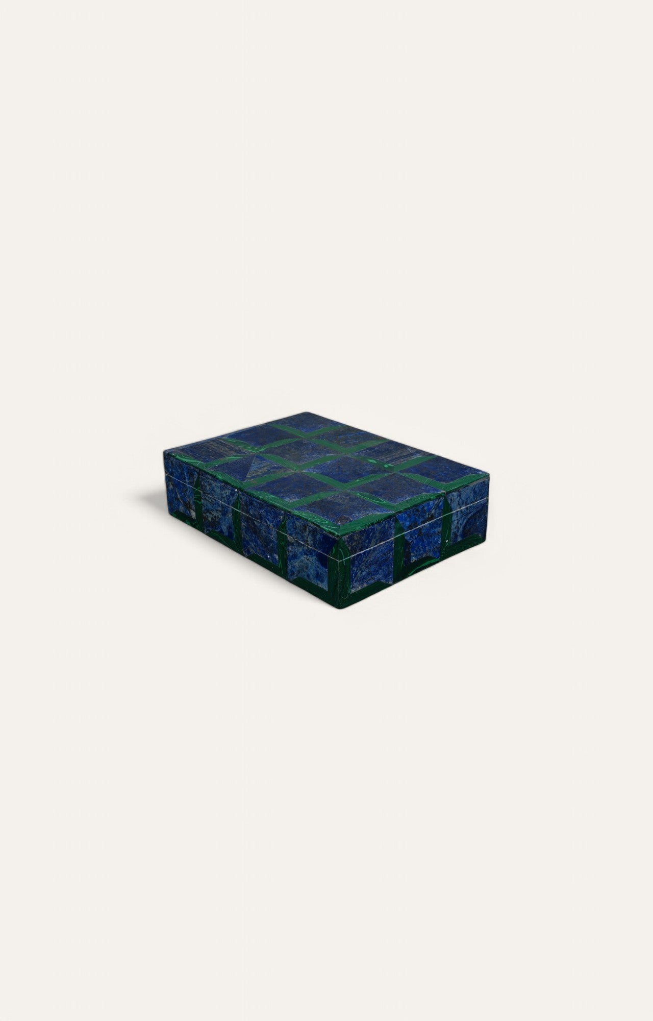Vintage storage box made of lapis stone segments in a geometric green-blue pattern.