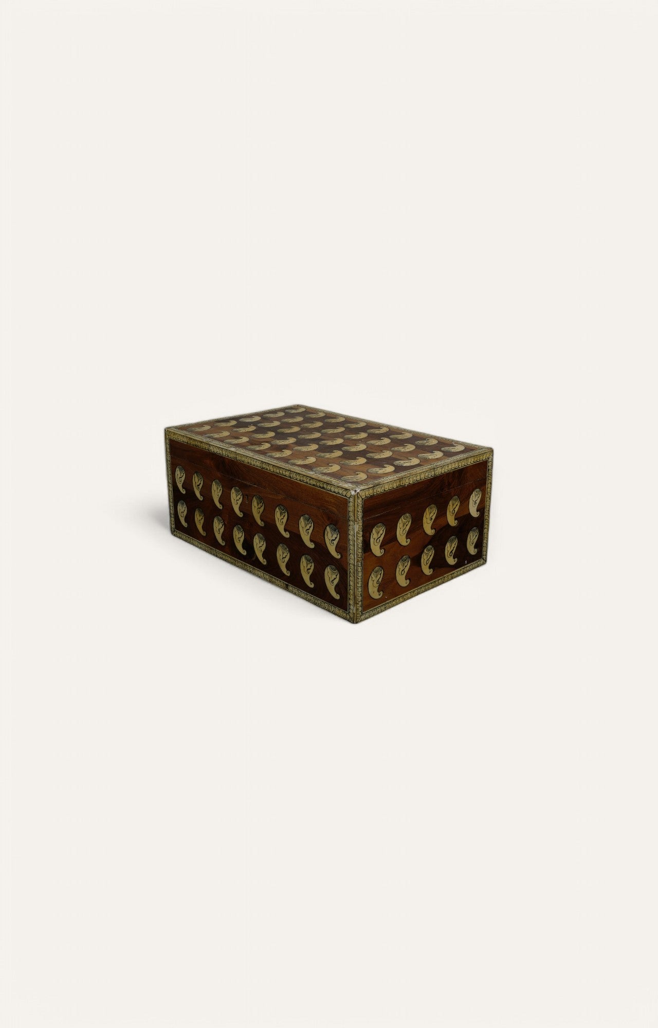 Rectangular vintage wooden box with brass paisley motifs and aged finish