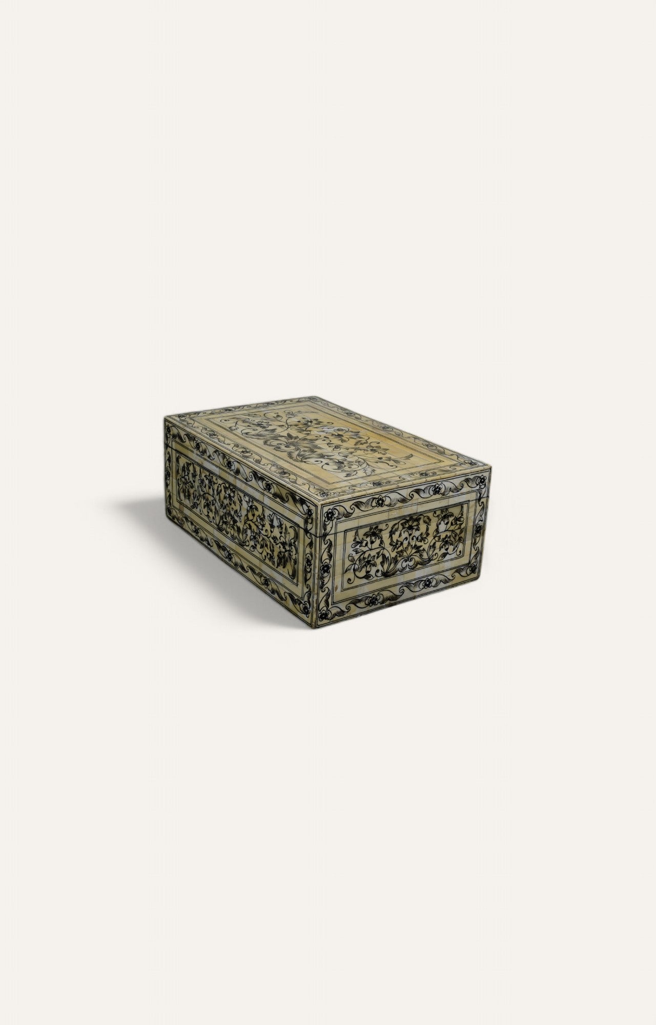 Floral hand-painted camel bone box in ivory tones with detailed black vine motifs.