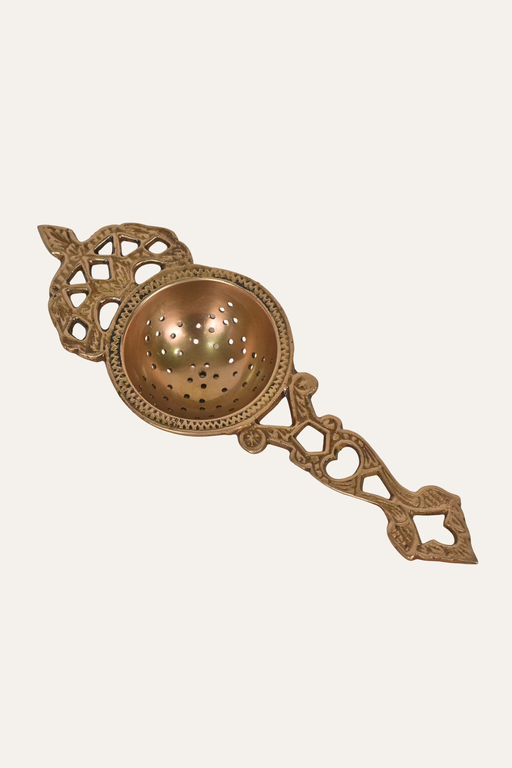 Handcrafted Antique Brass Tea Strainer with Decorative Handle & Perforated Bowl