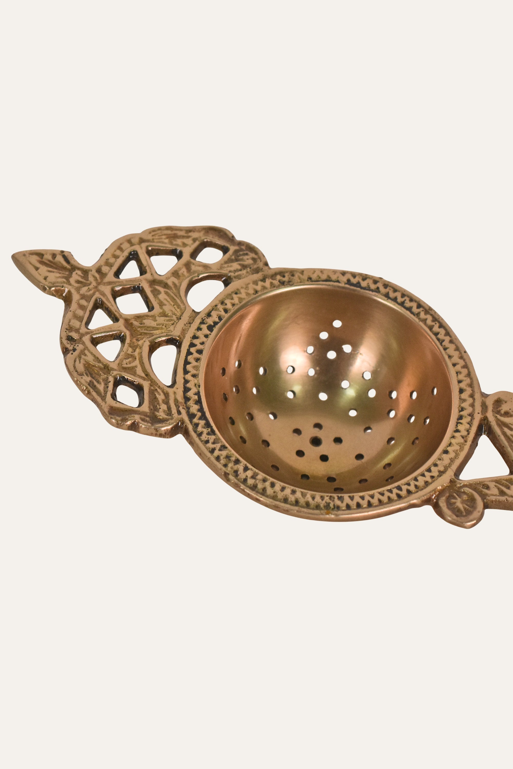 Handcrafted Antique Brass Tea Strainer with Decorative Handle & Perforated Bowl