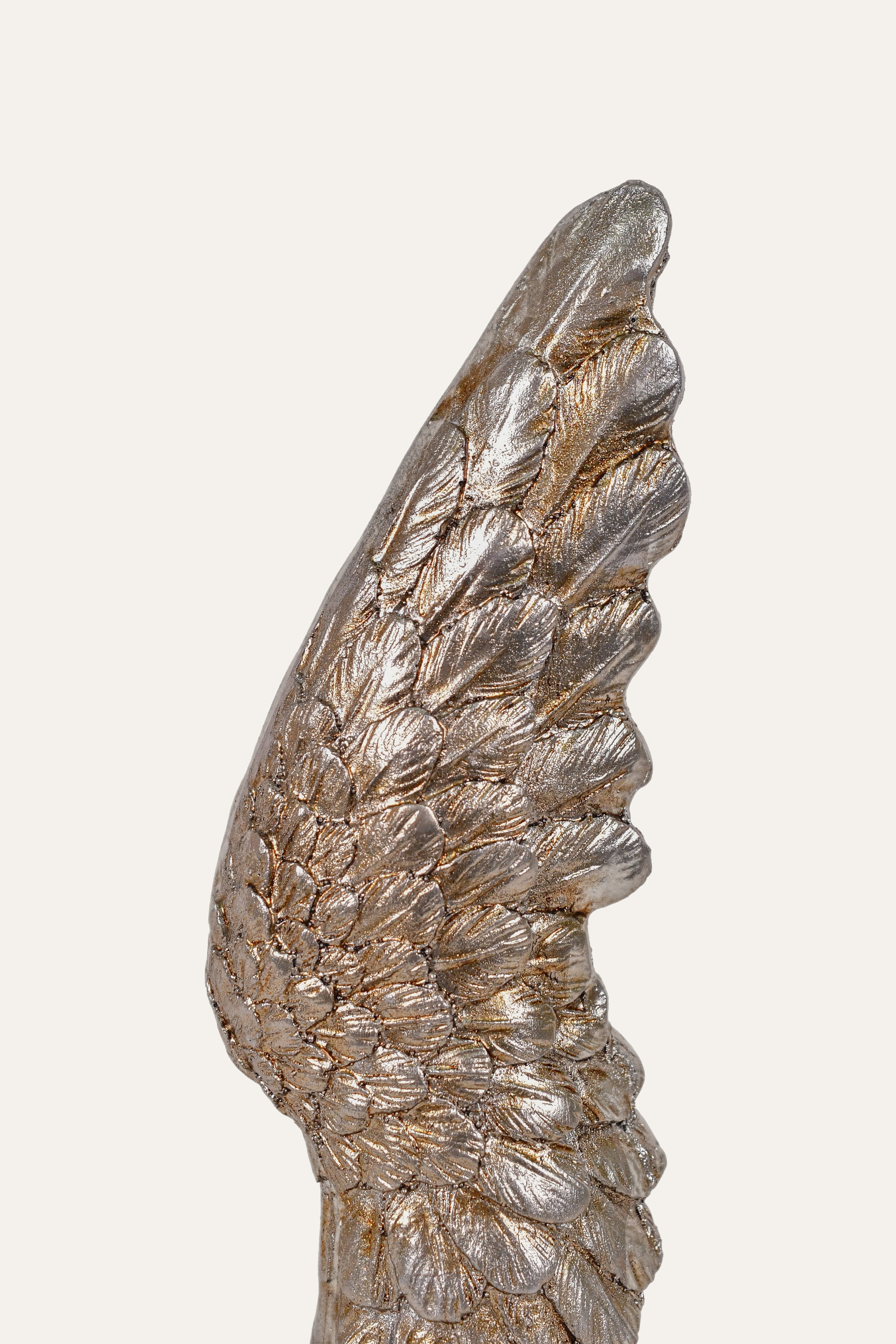 Decorative metallic wing sculpture