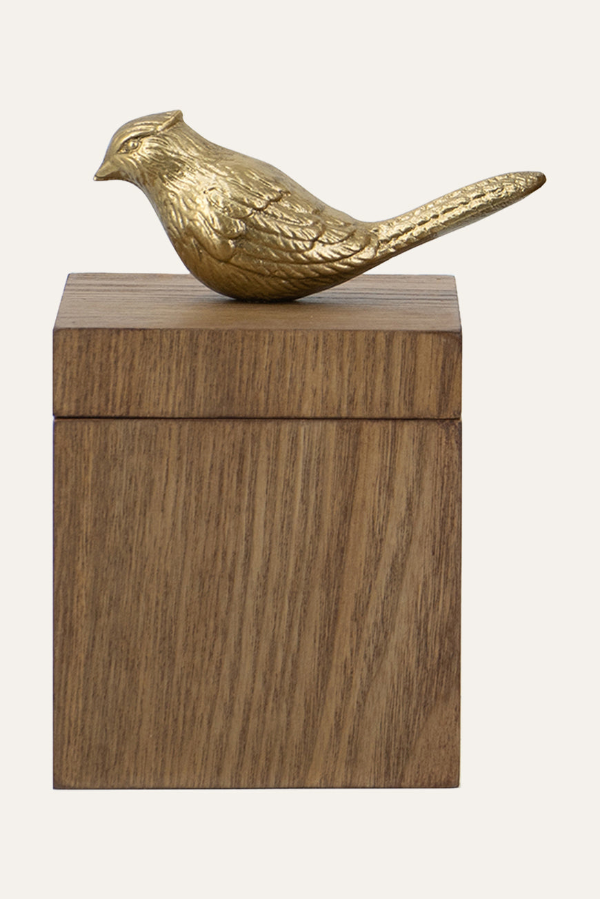 Decorative box with a gold bird