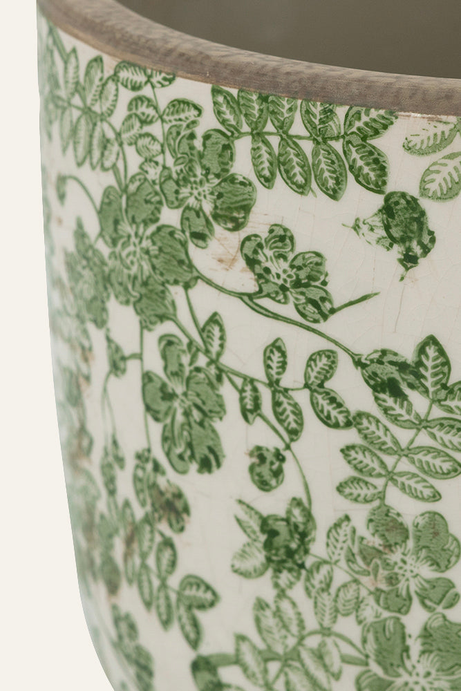 Ceramic pot with green floral pattern