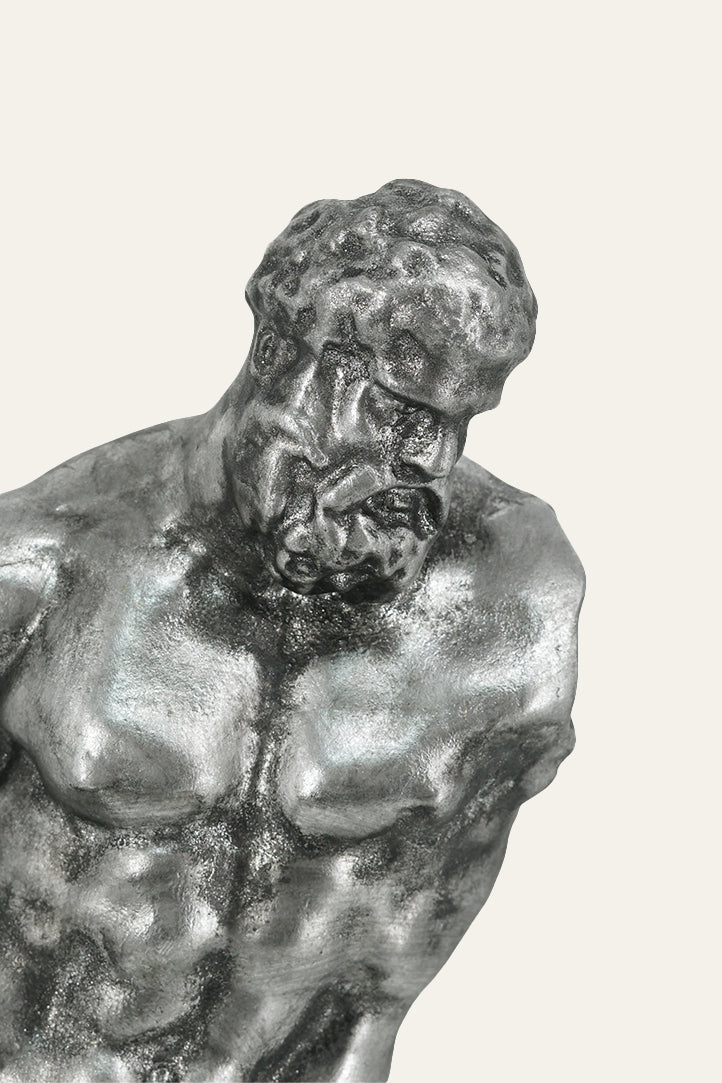 Statue of a muscular figure
