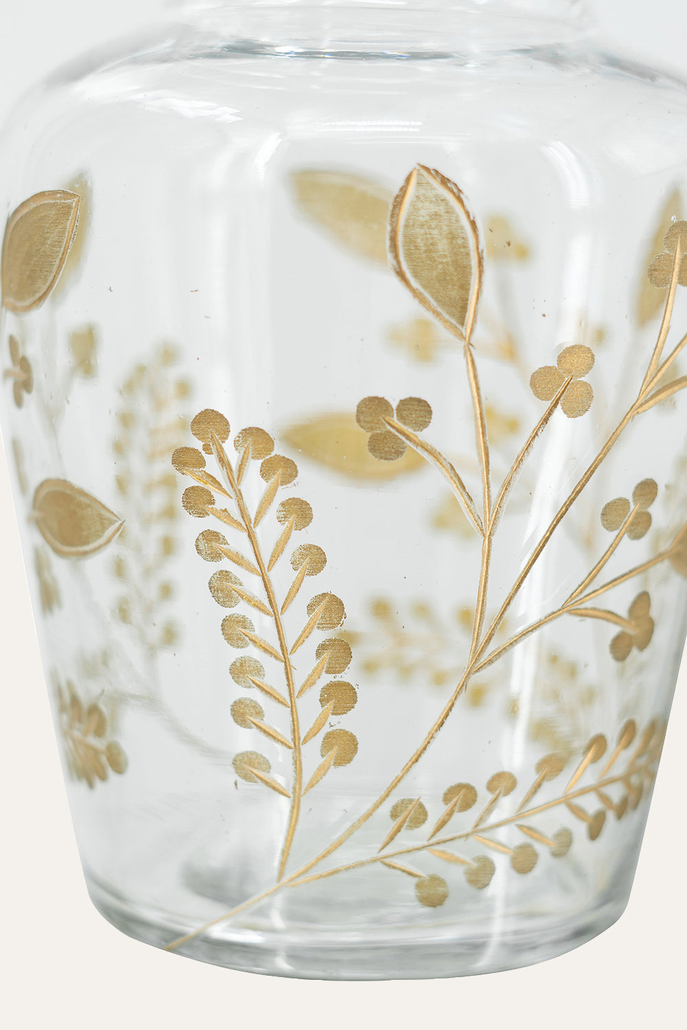Glass vase with gold botanical patterns