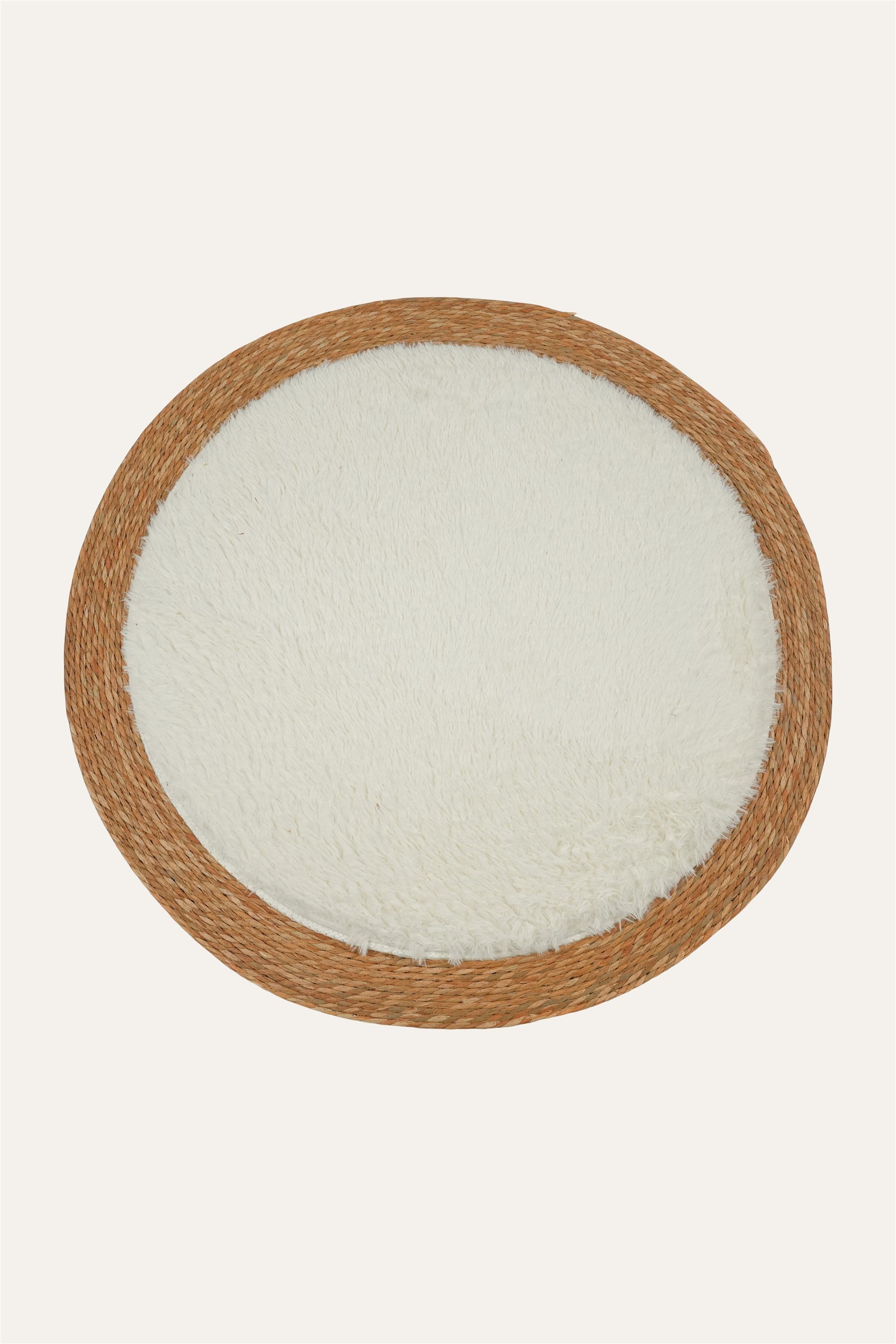 Handwoven natural fiber round floor mat