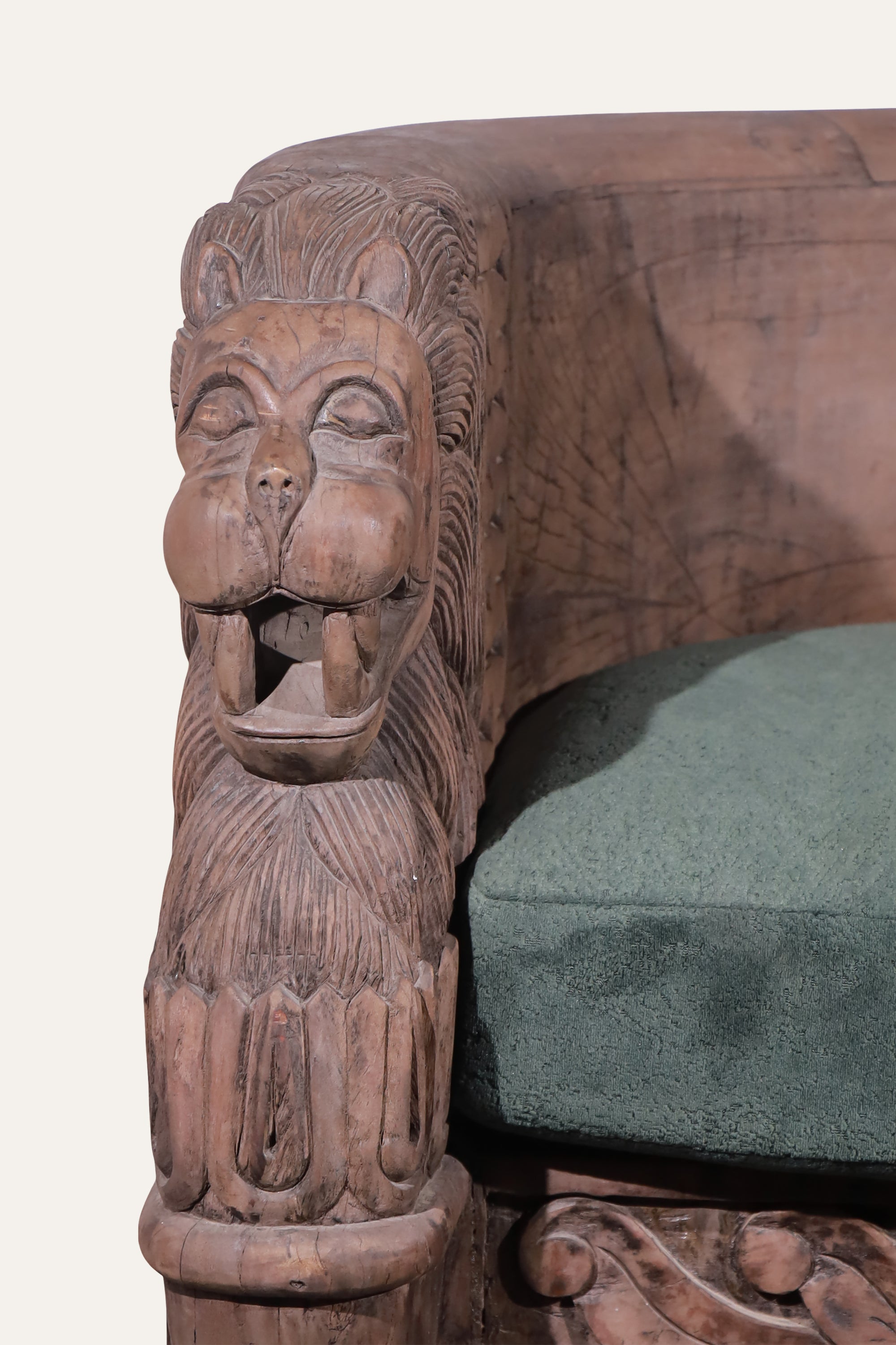 Hand-Carved Wooden Upholstered Barrel Chair with Lion Armrests.
