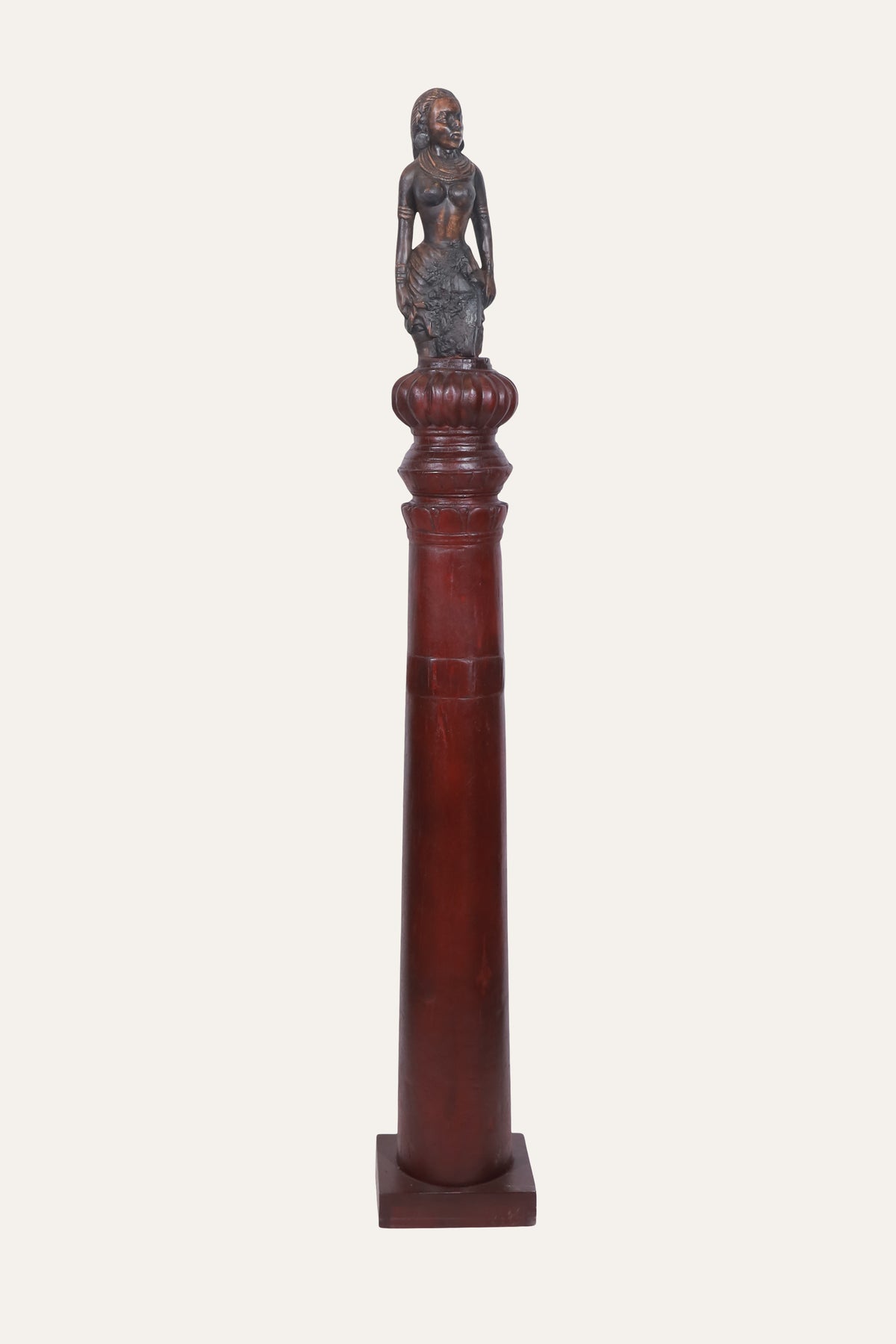 Sculpted Apsara Figurine on Decorative Pedestal Column