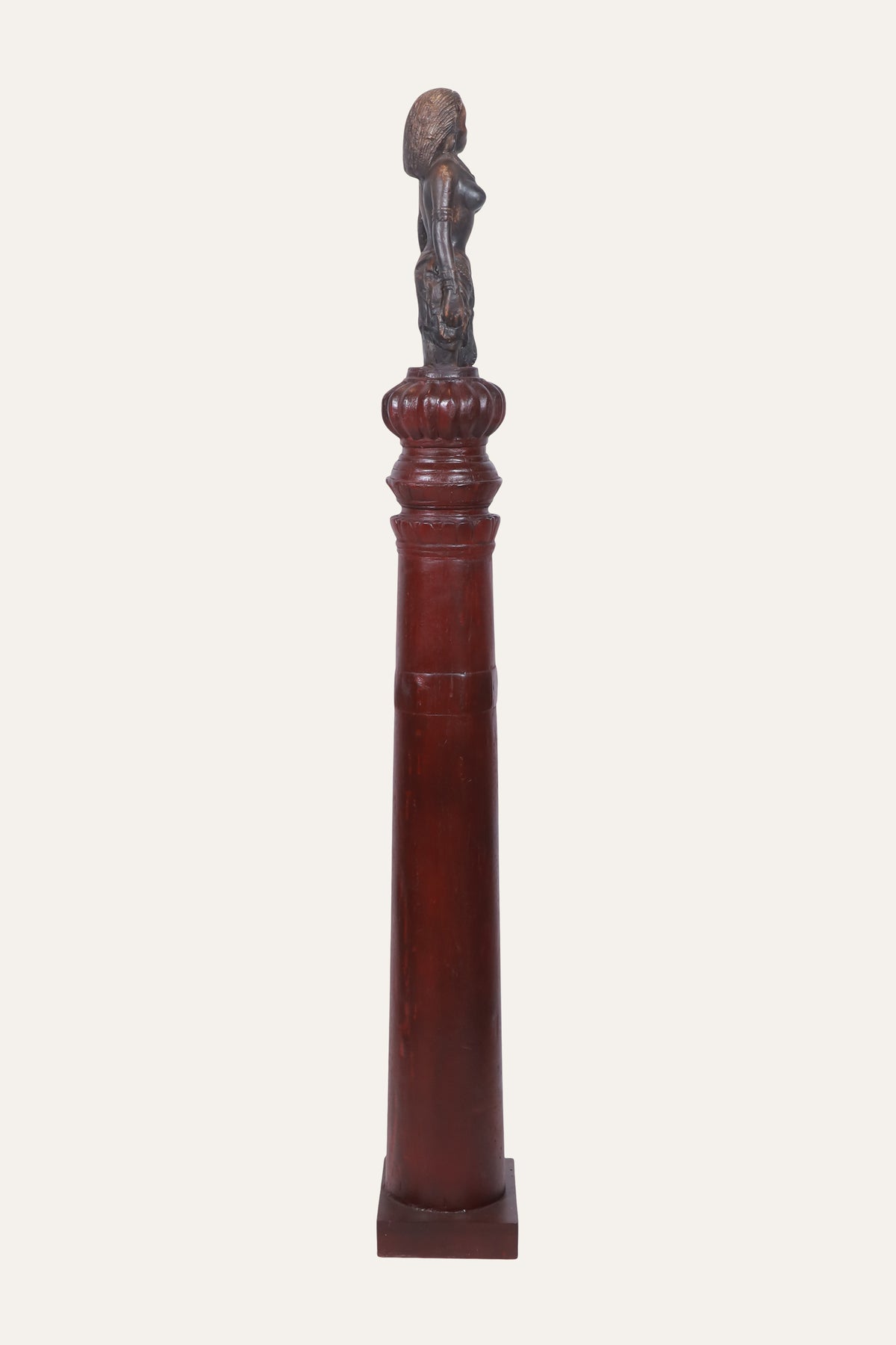 Sculpted Apsara Figurine on Decorative Pedestal Column
