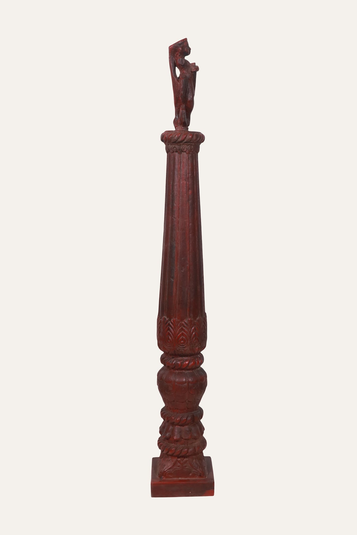 Carved Deity Figure on Red Terracotta Column