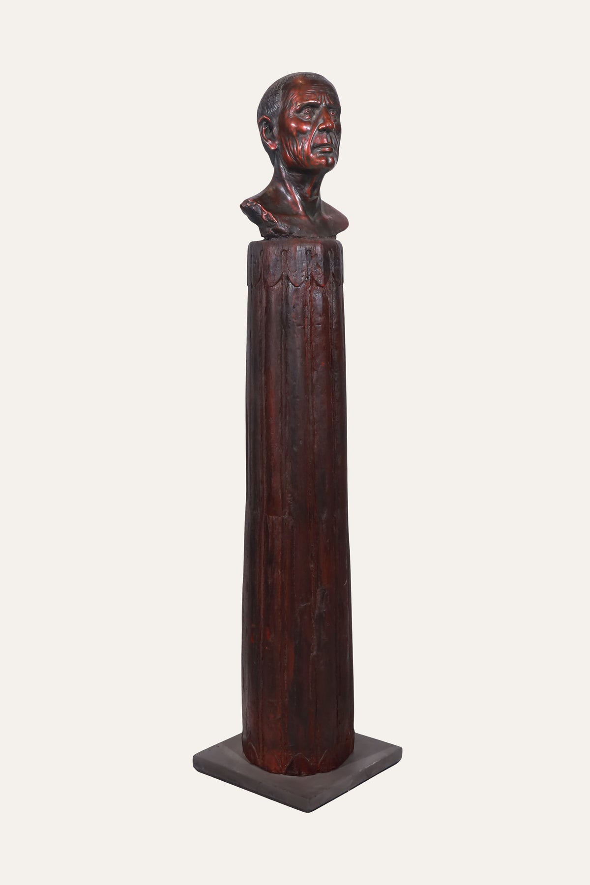 Carved Male Portrait Bust on Tall Faceted Pedestal