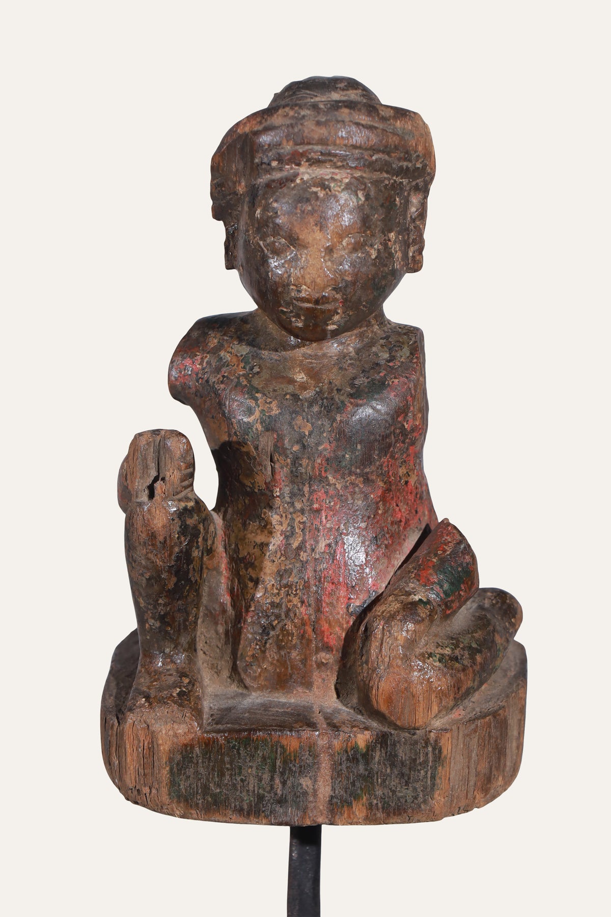Antique Seated Carved Wooden Folk Figurine on Black Display Stand