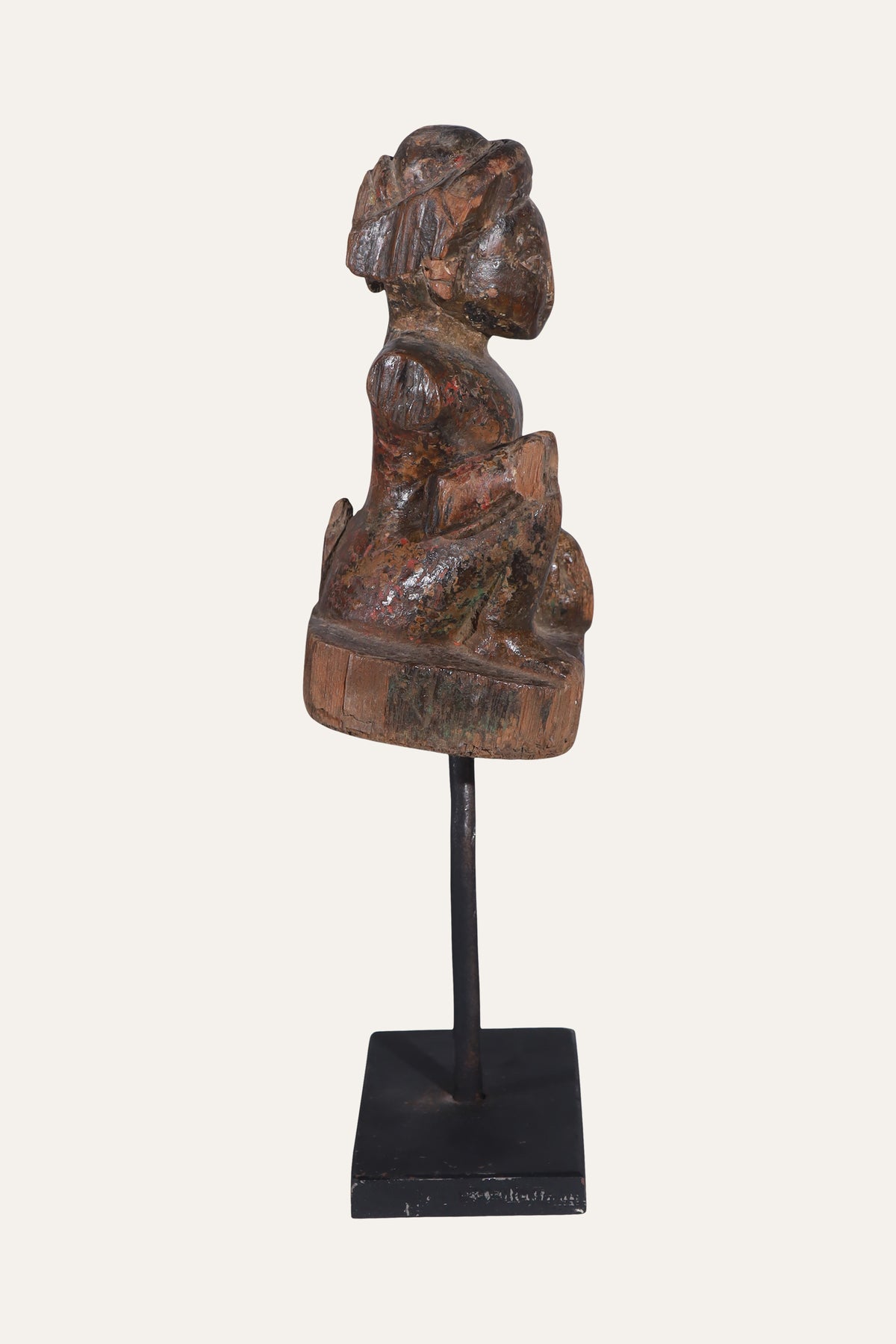 Antique Seated Carved Wooden Folk Figurine on Black Display Stand