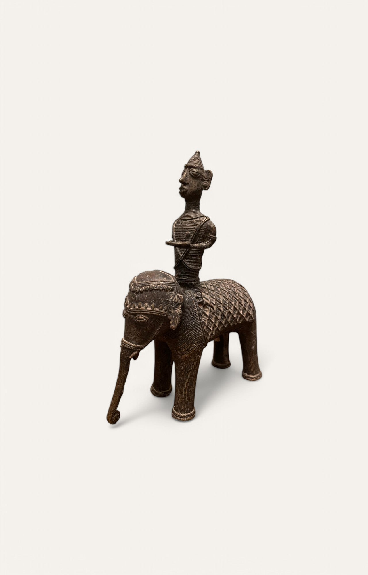 Man On Elephant Sculpture