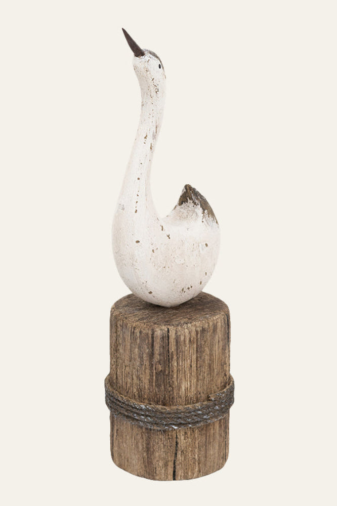 Minimal coastal swan sculpture