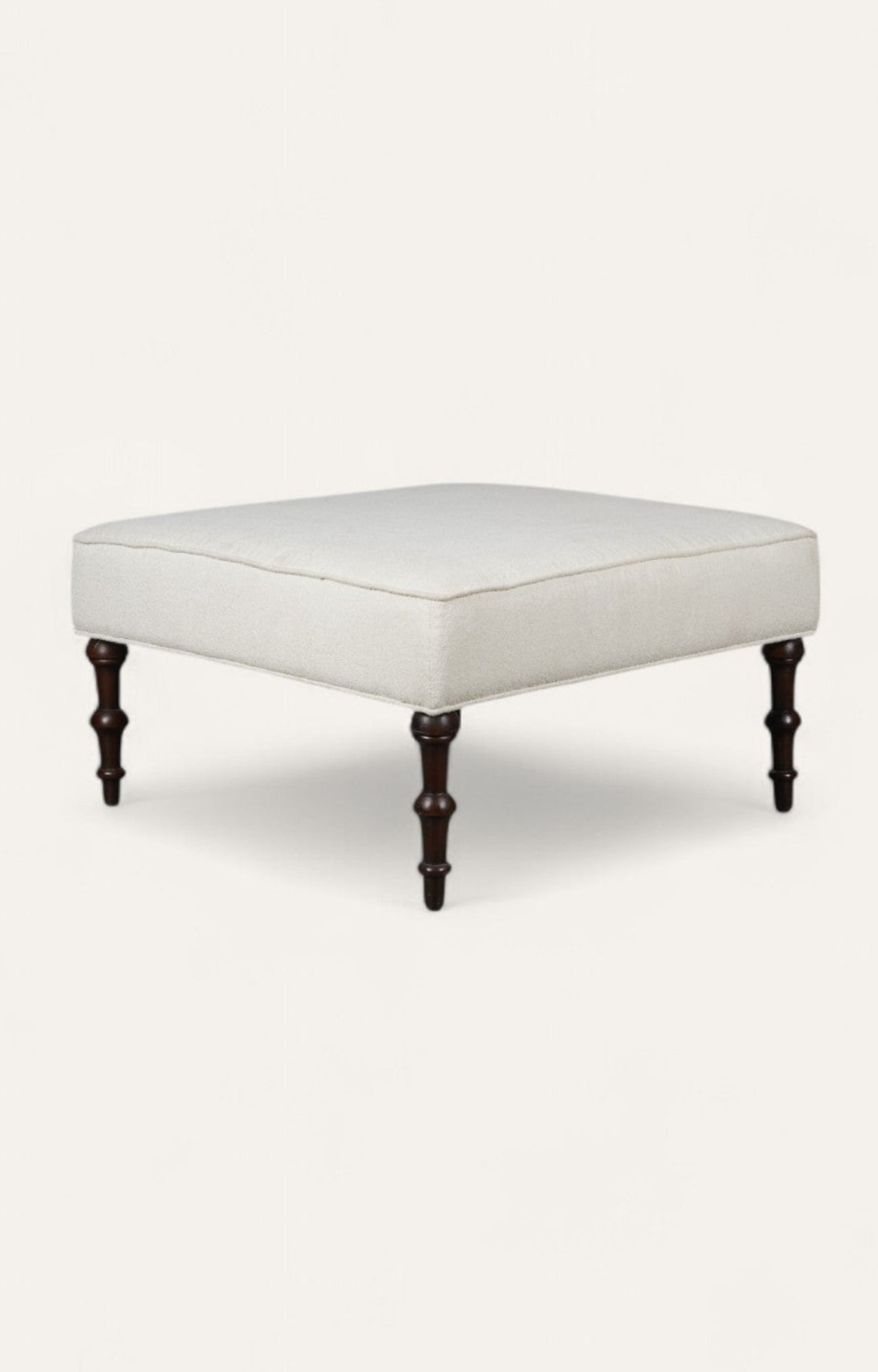 Ottoman with Cream Upholstery