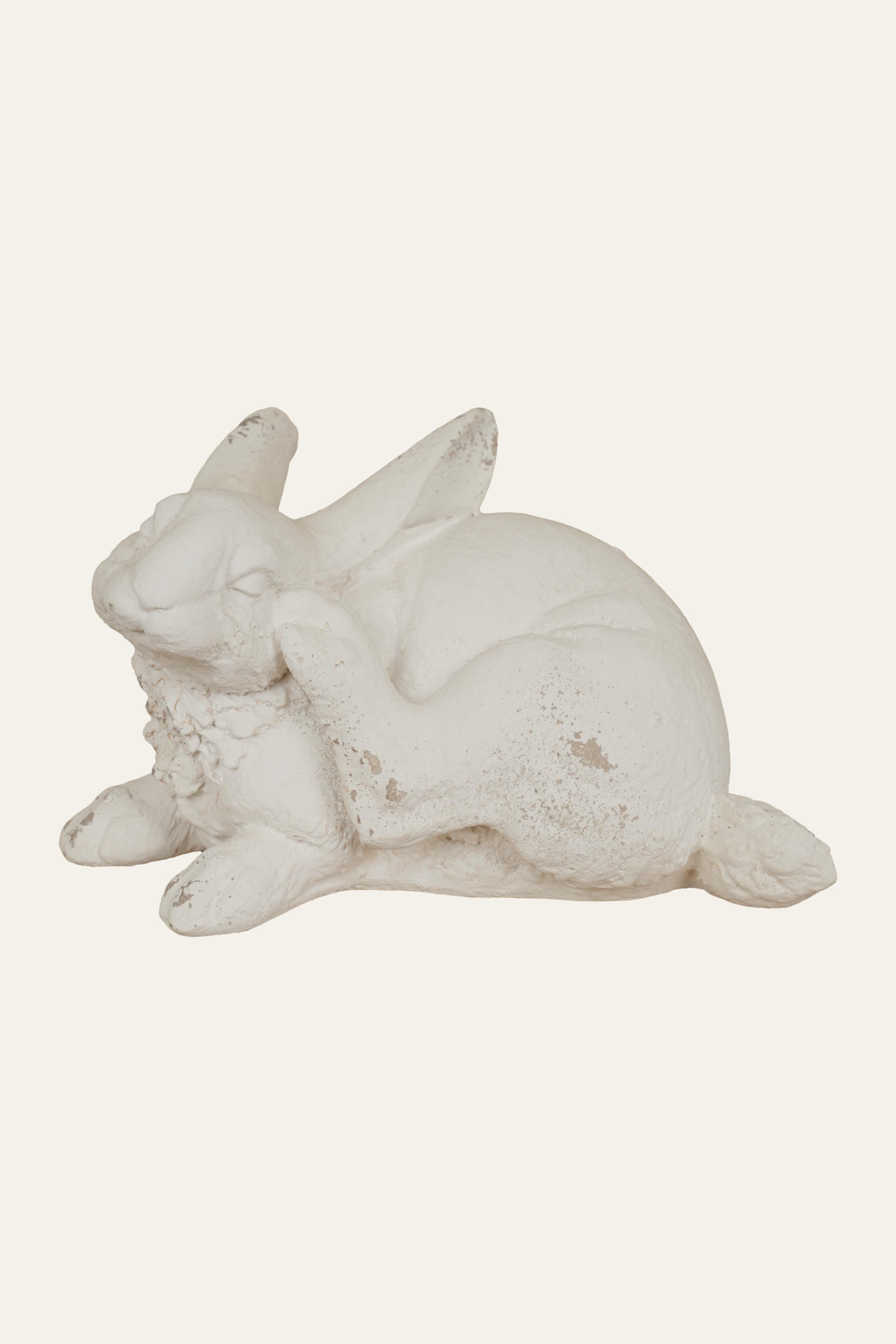 Resting rabbit showpiece for shelf decoration