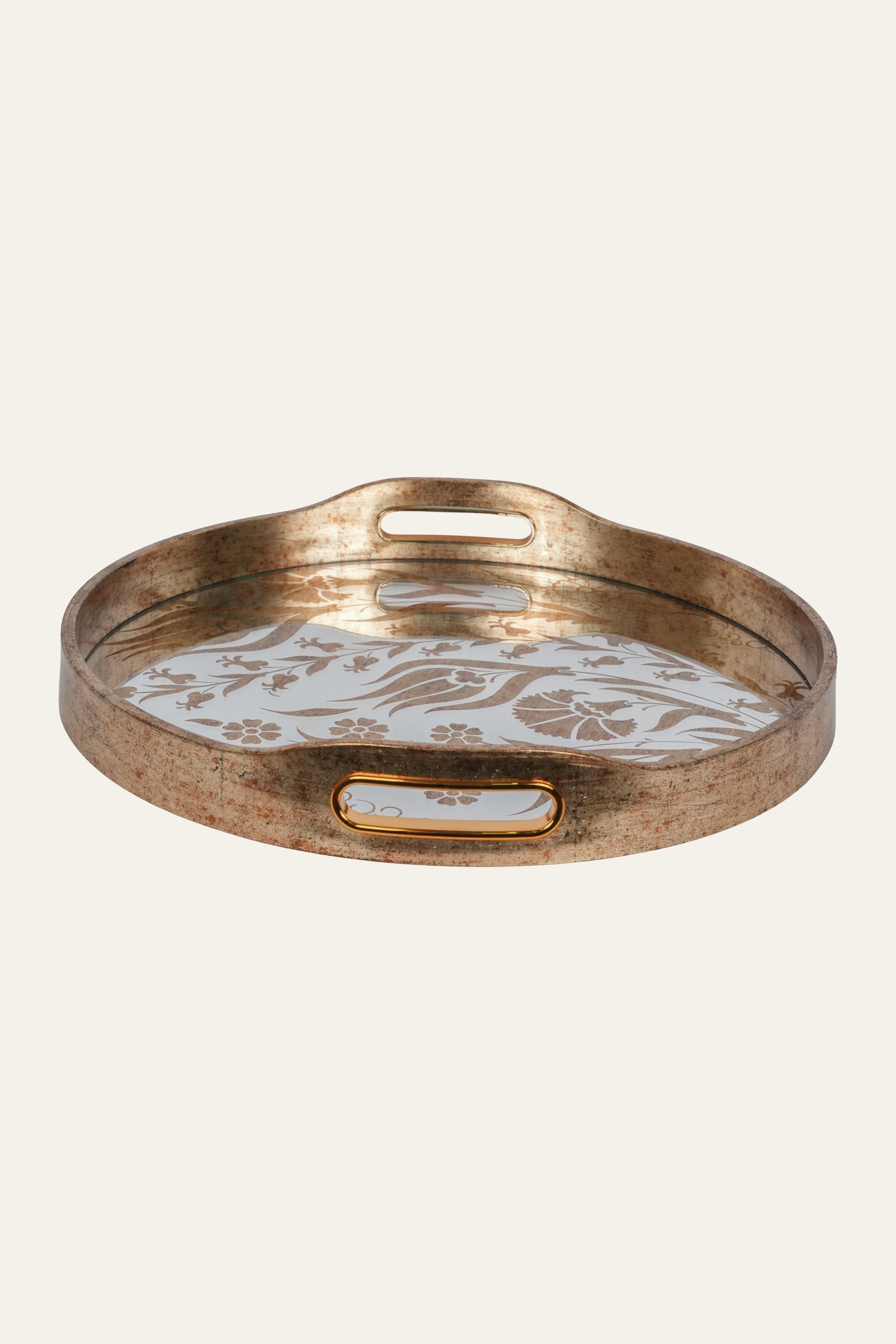 Round glass tray with gold floral surface design