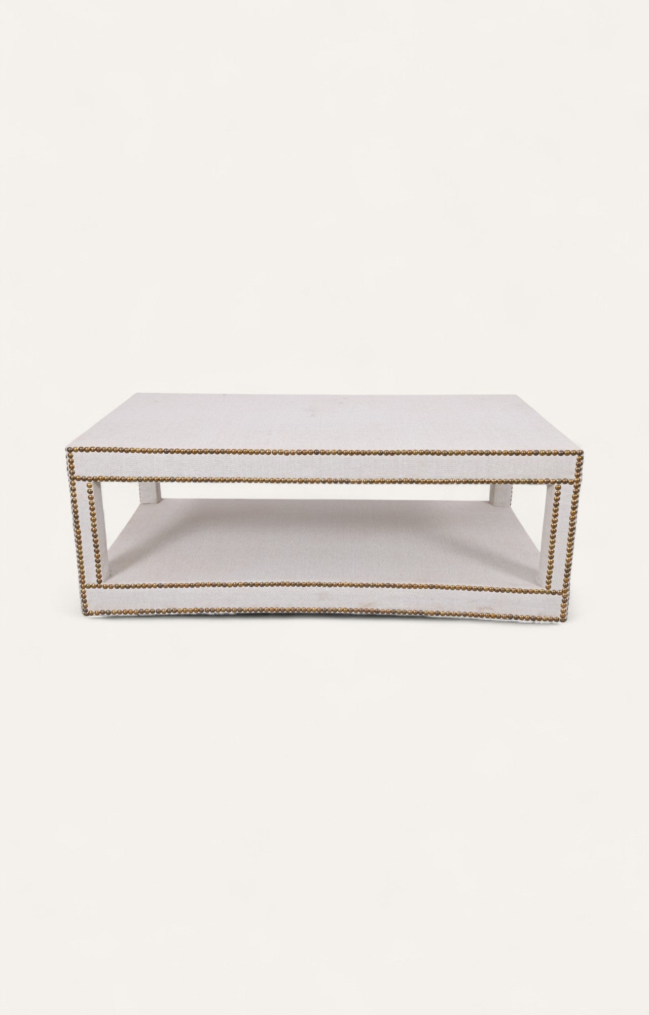 White coffee table with gold accents