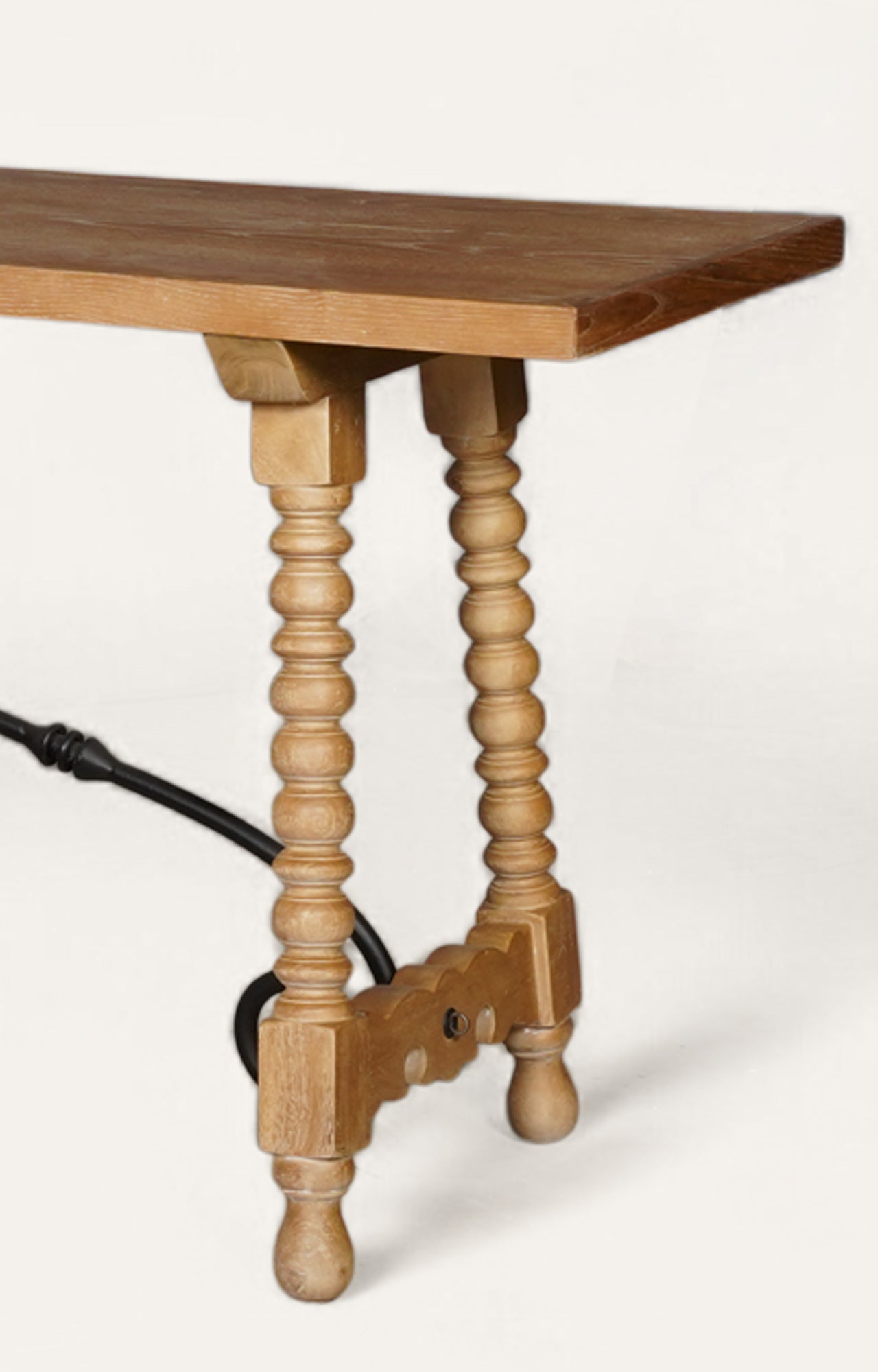Wooden table with spindle legs