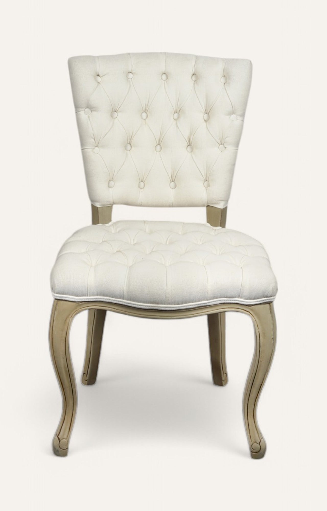 upholstered chair with tufted backrest