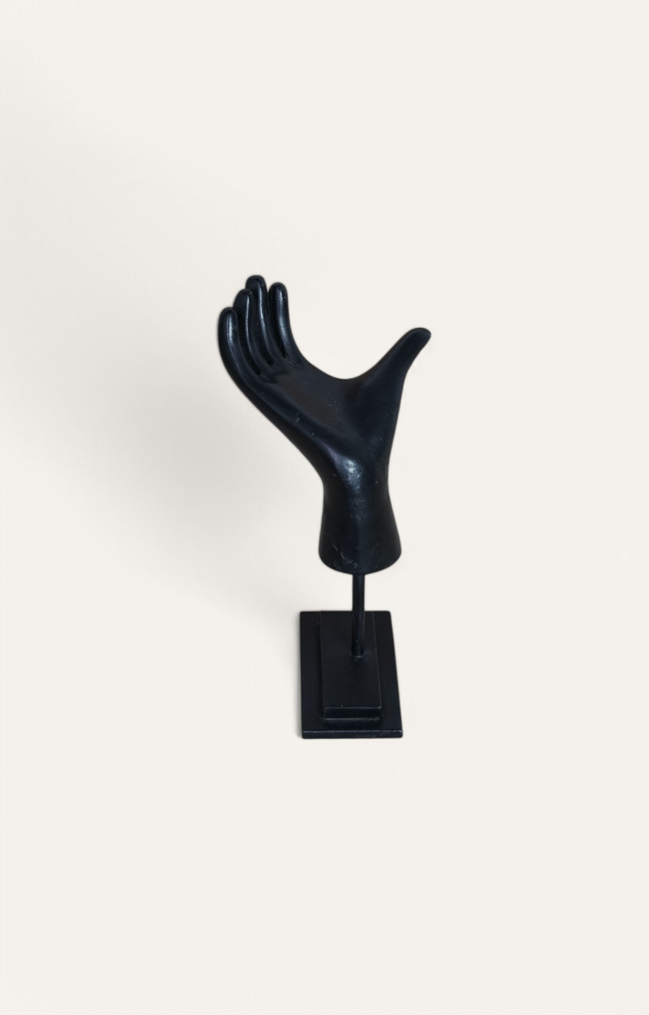 black hand statue
