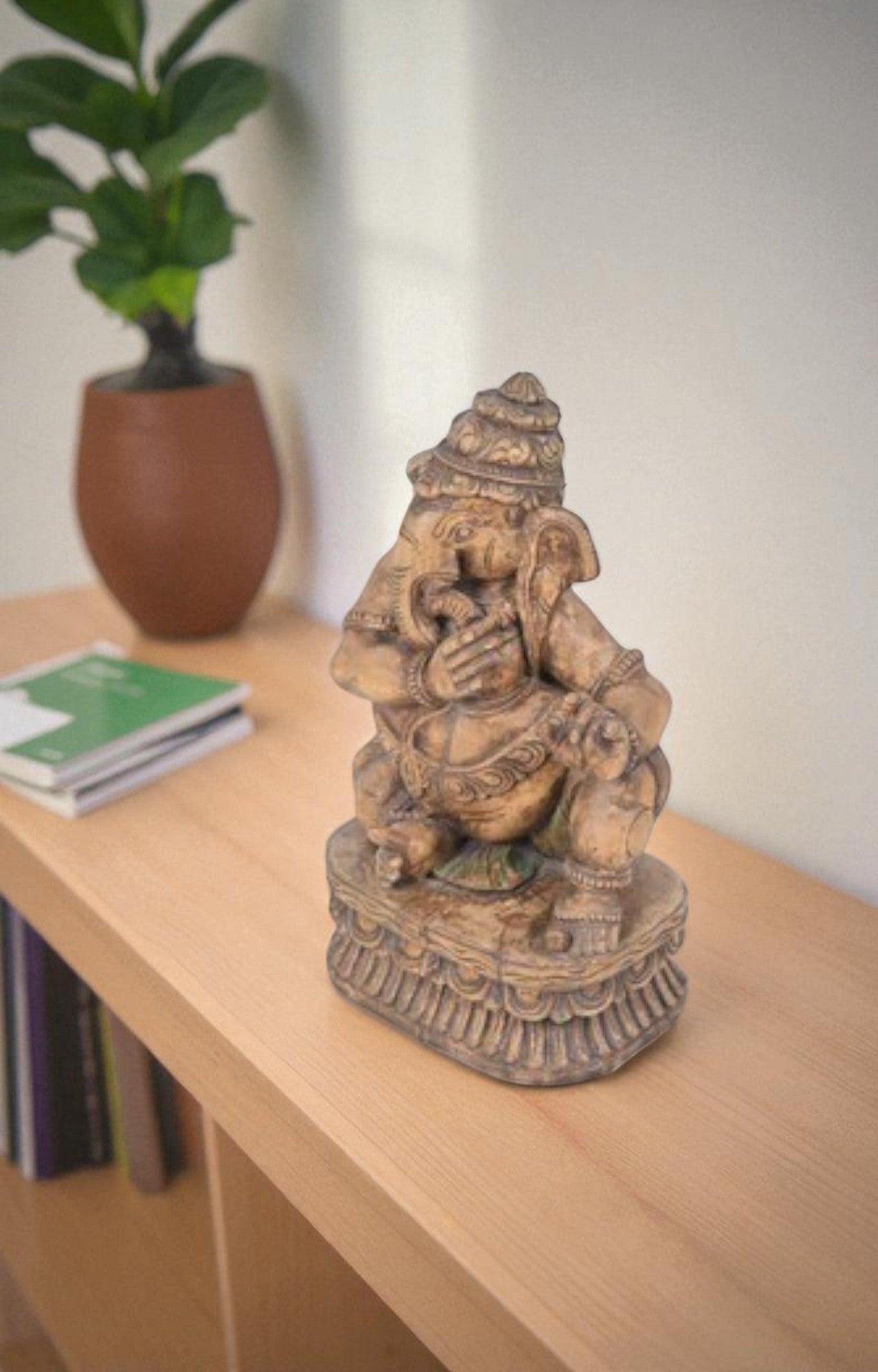 Hand-carved Ganesha Sculpture in Seated Posture