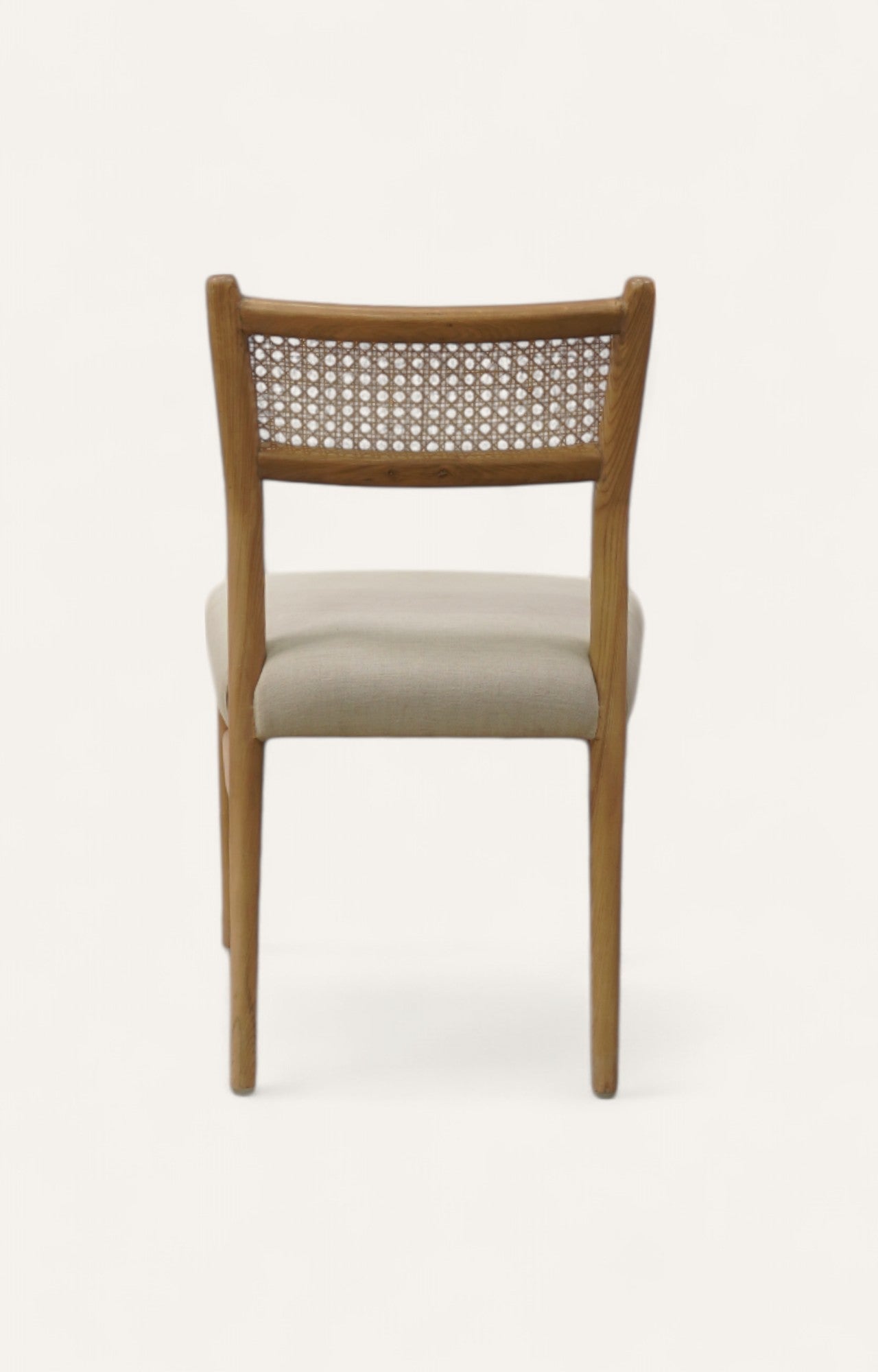 Wooden chair with woven backrest
