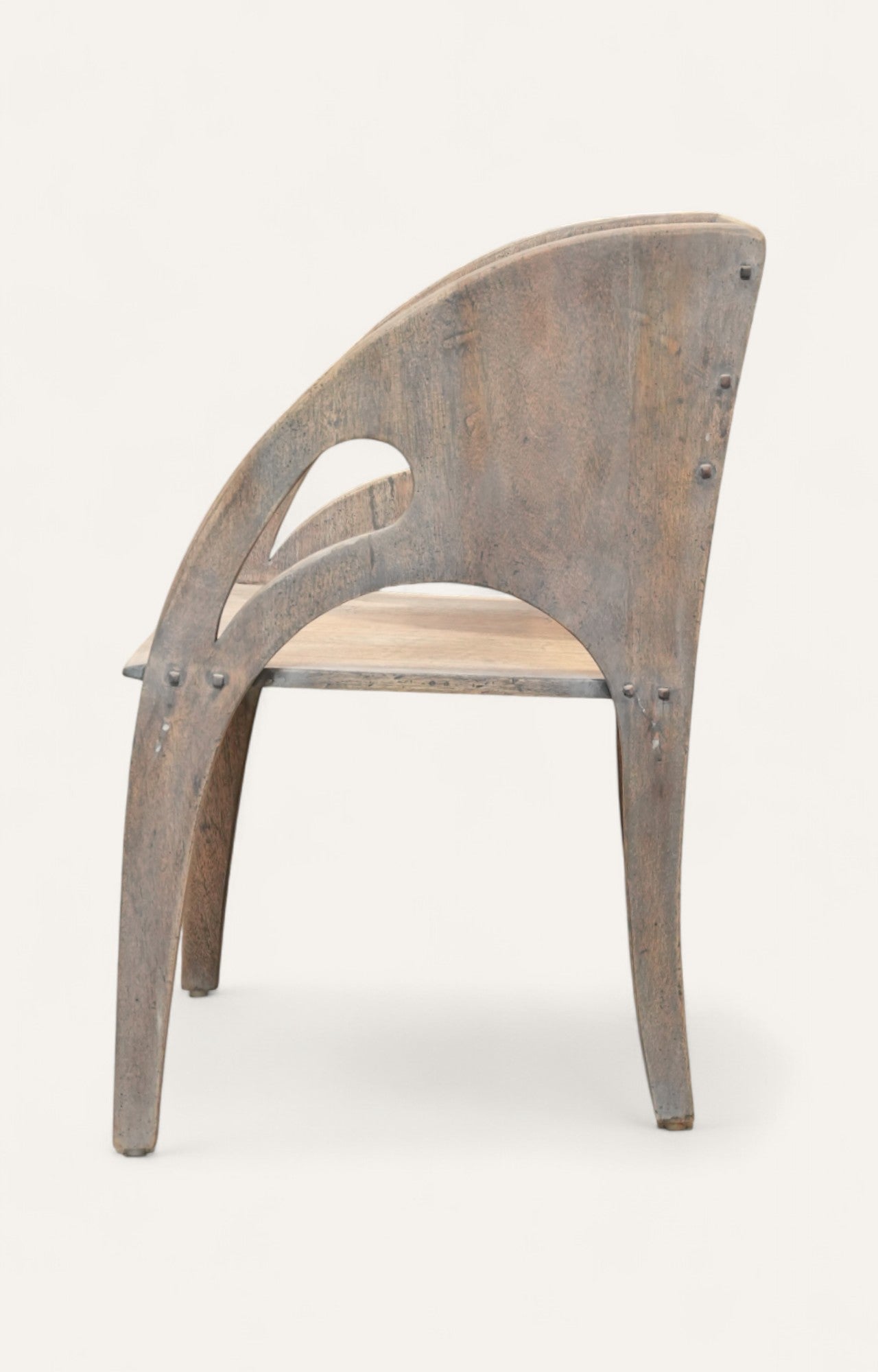 Wooden chair with a curved backrest