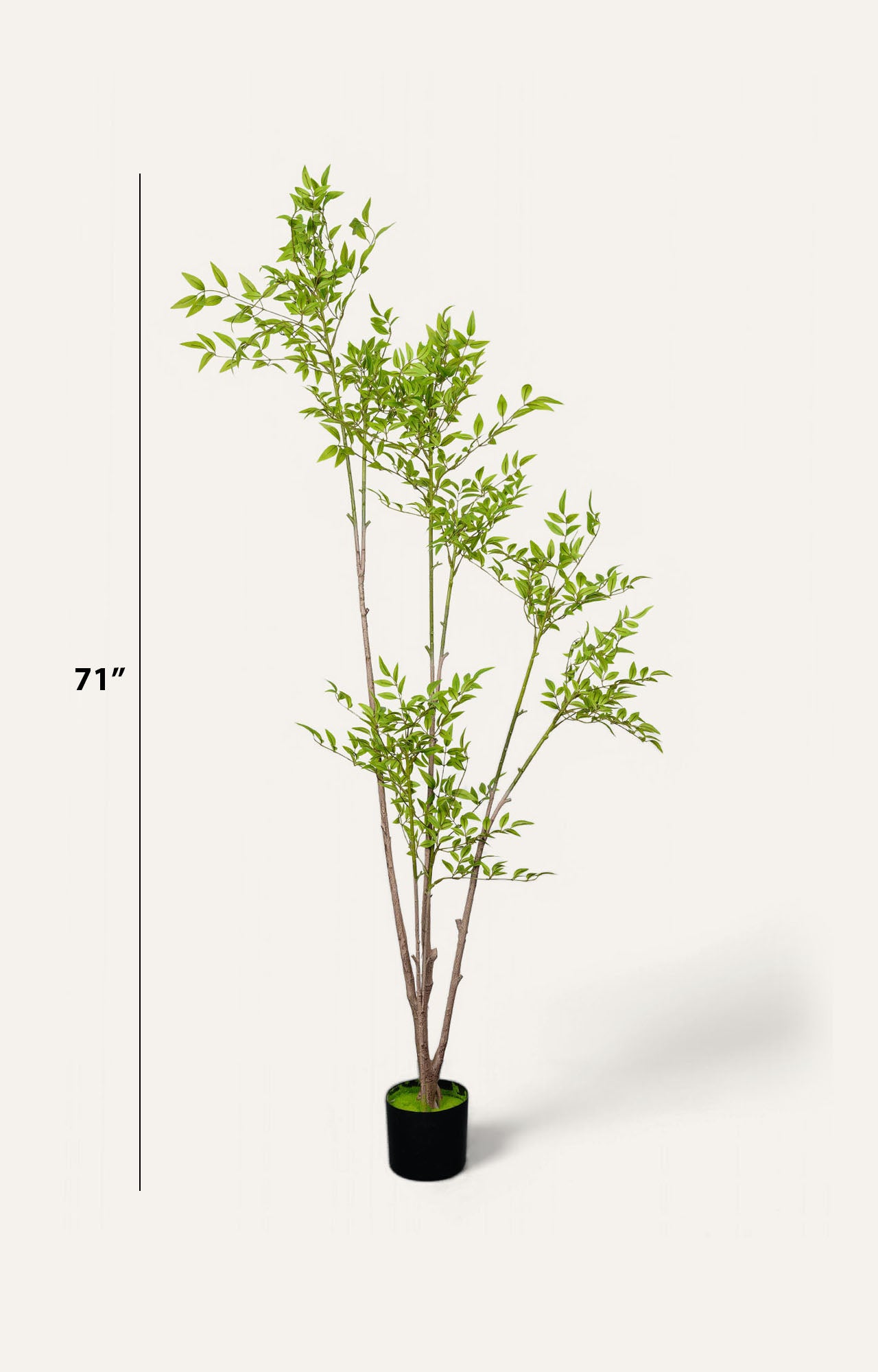 Artificial potted plant with green leaves