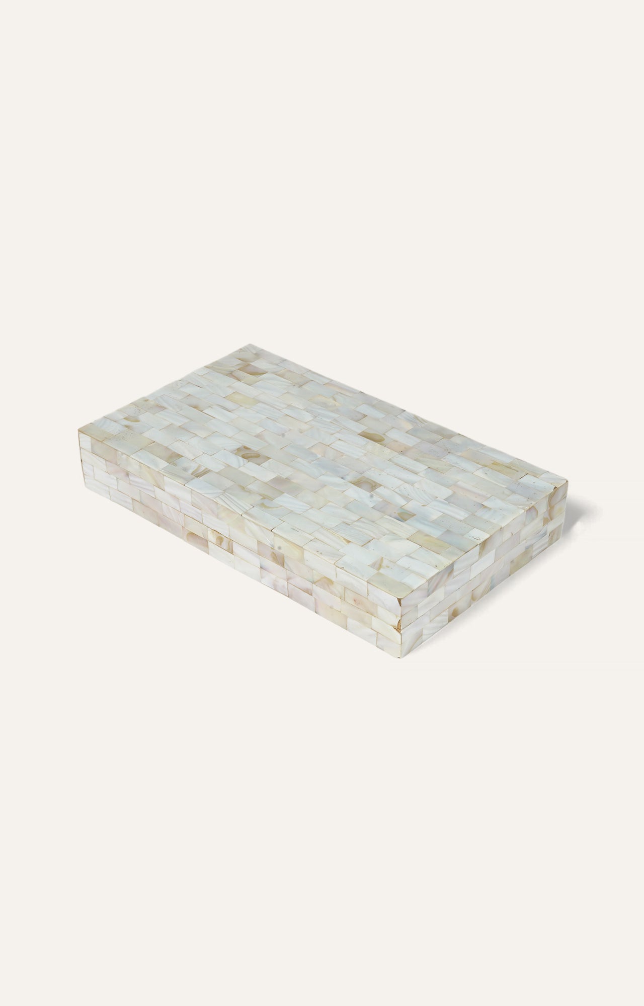 Rectangular box completely covered in iridescent, light-colored mother of pearl inlay.