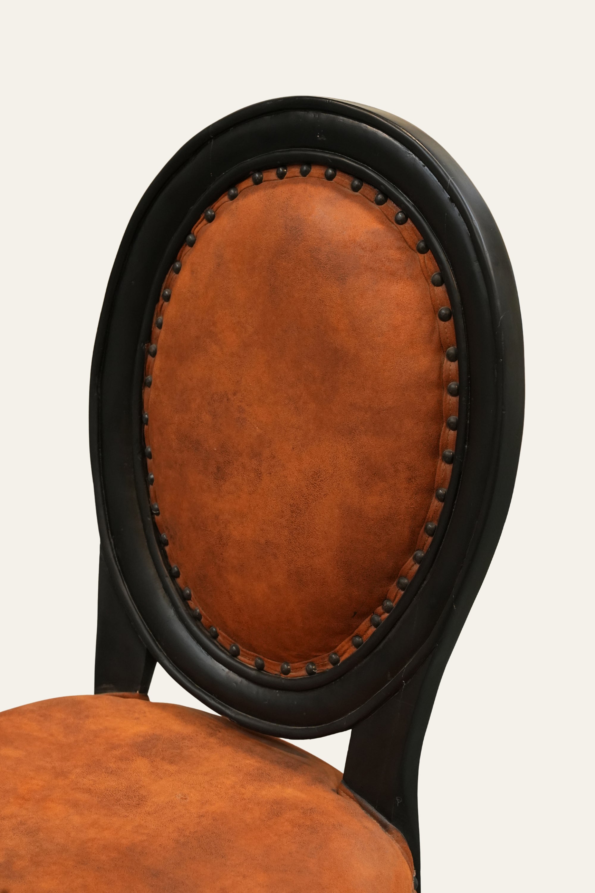 Oval Back Upholstered Dining Chair with Brass Studs