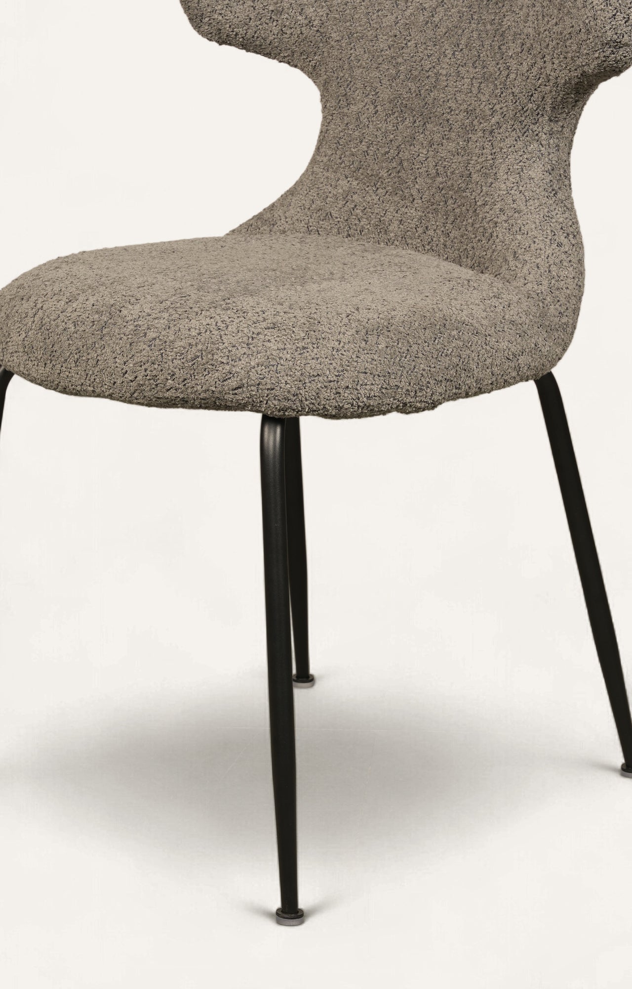 Chair with beige cushioned seat