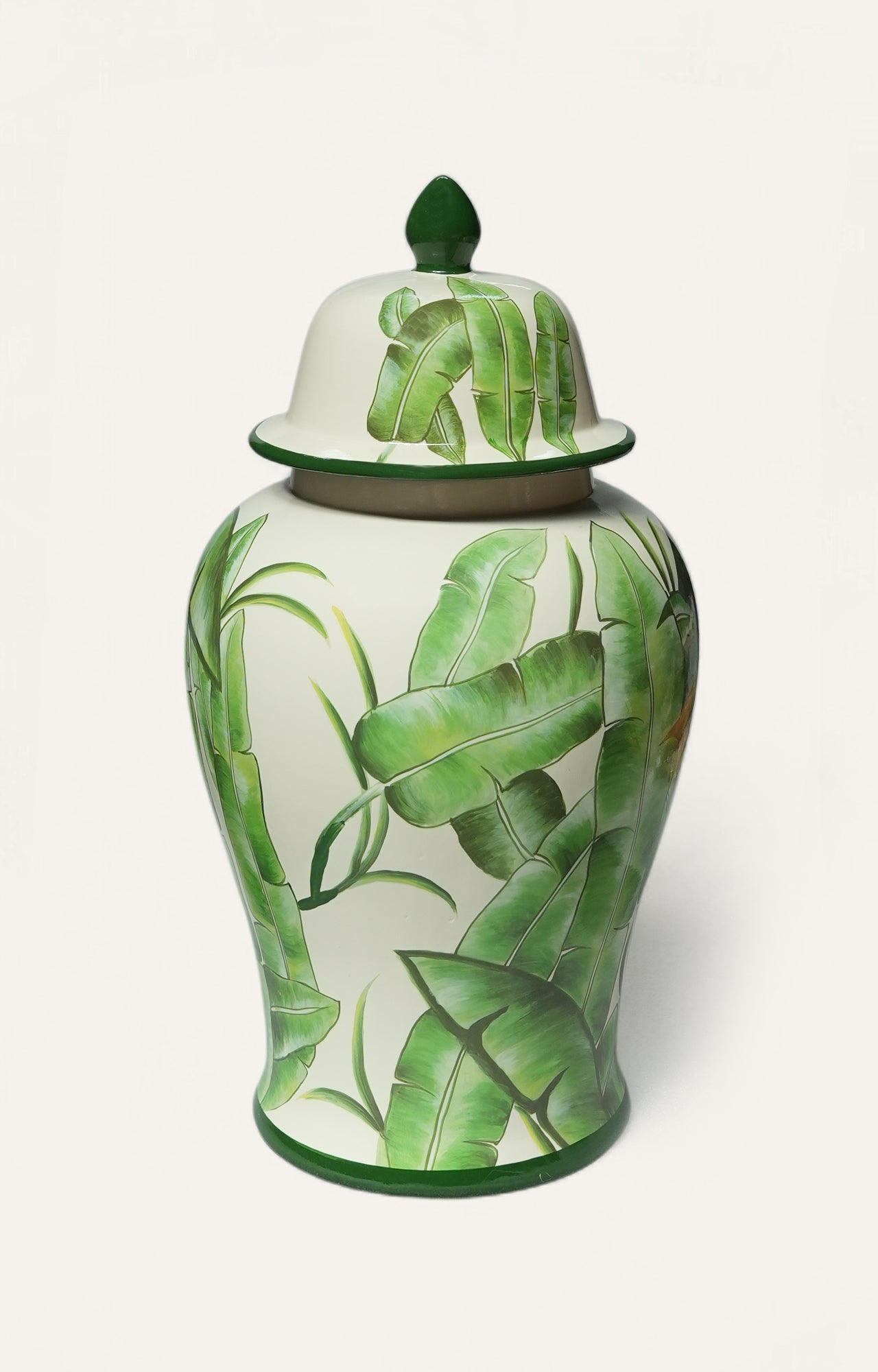 Decorative vase with green leaf patterns