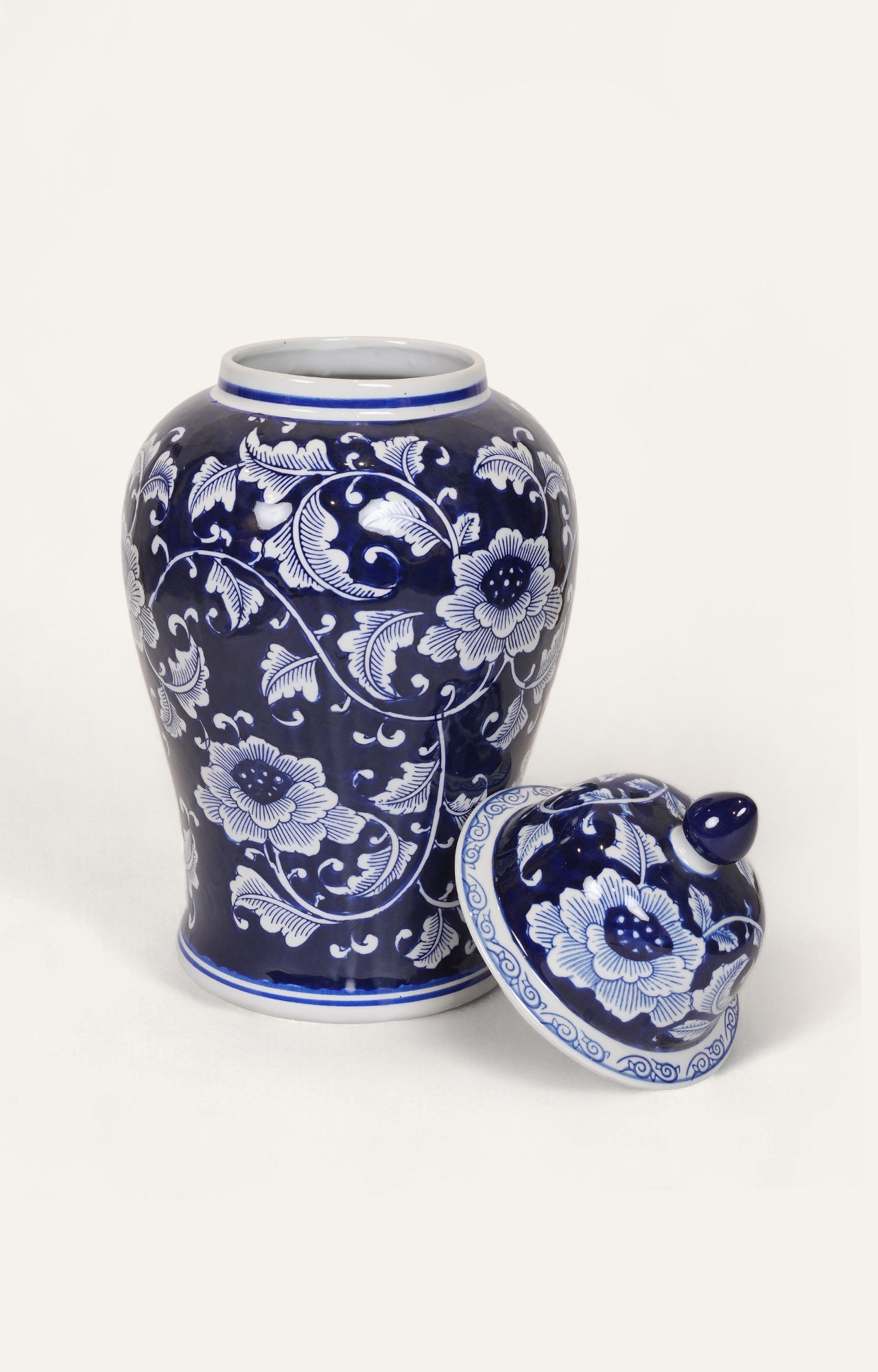 floral-patterned ceramic jar with lid