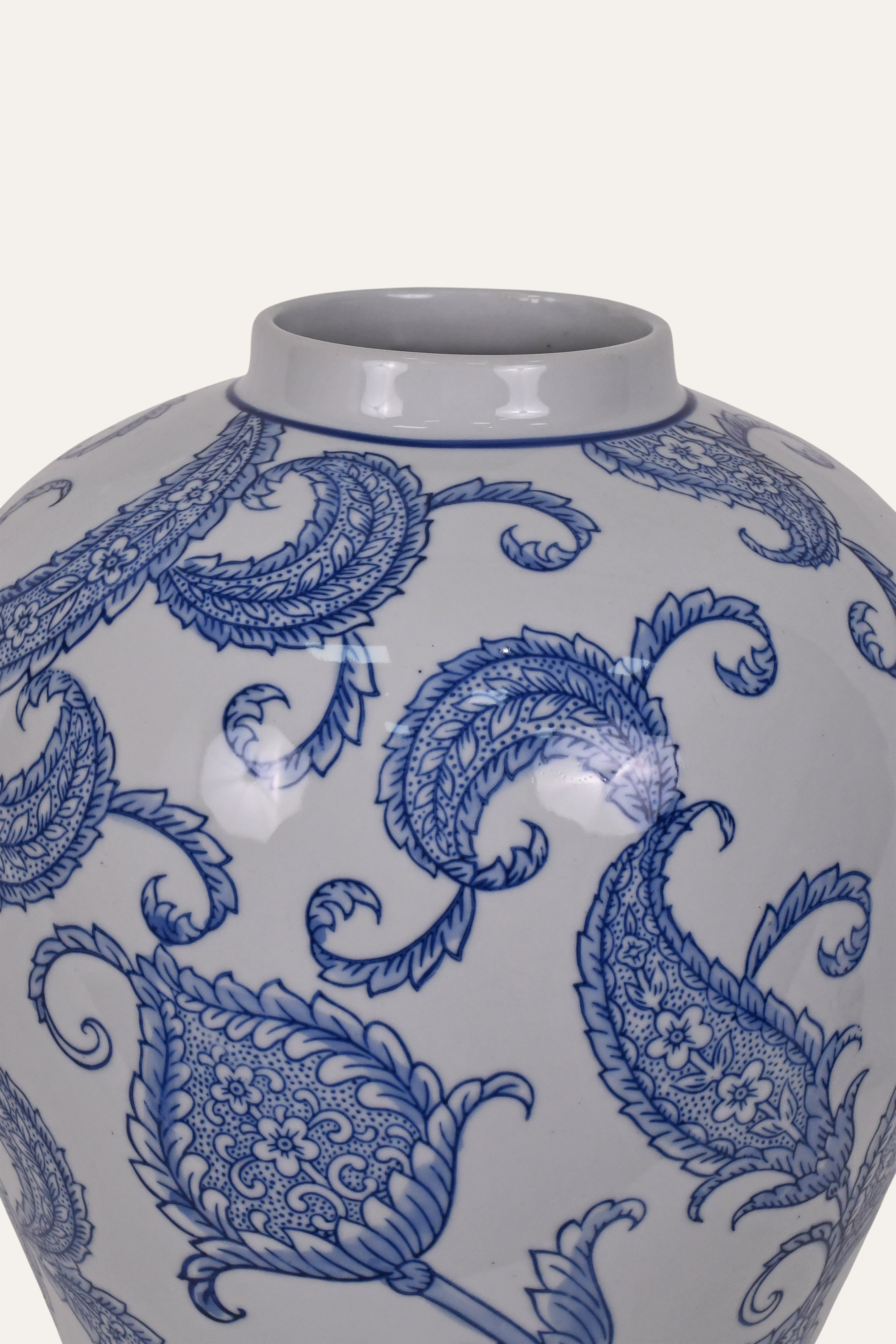 ceramic vase with blue paisley patterns