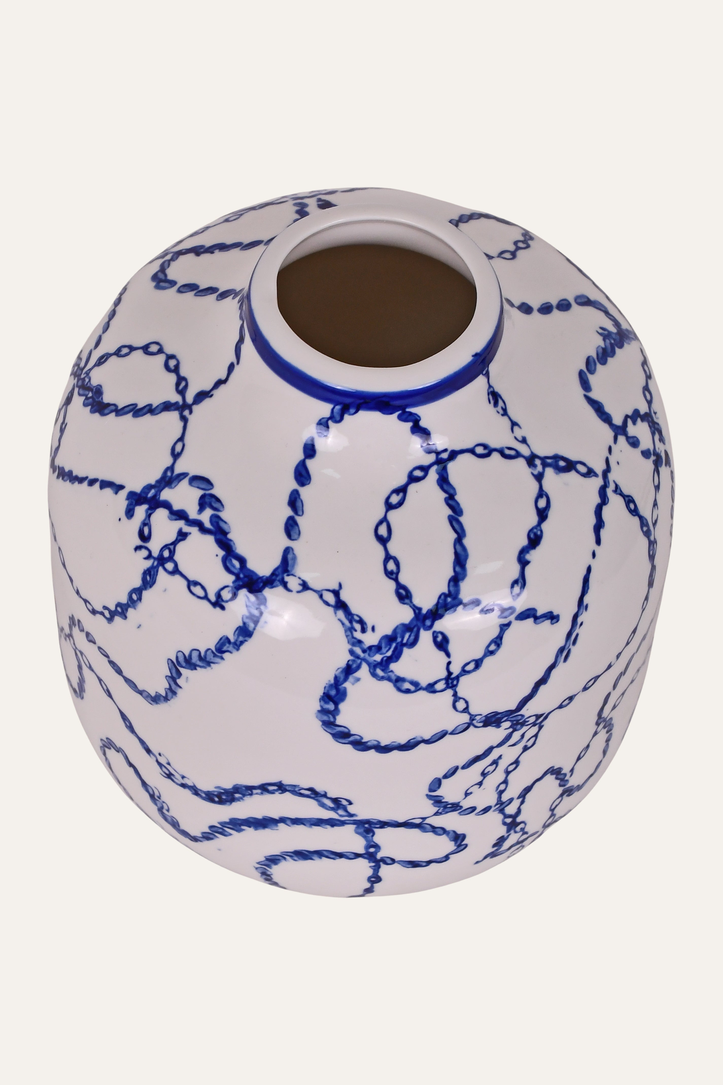 Ceramic vase with blue abstract patterns