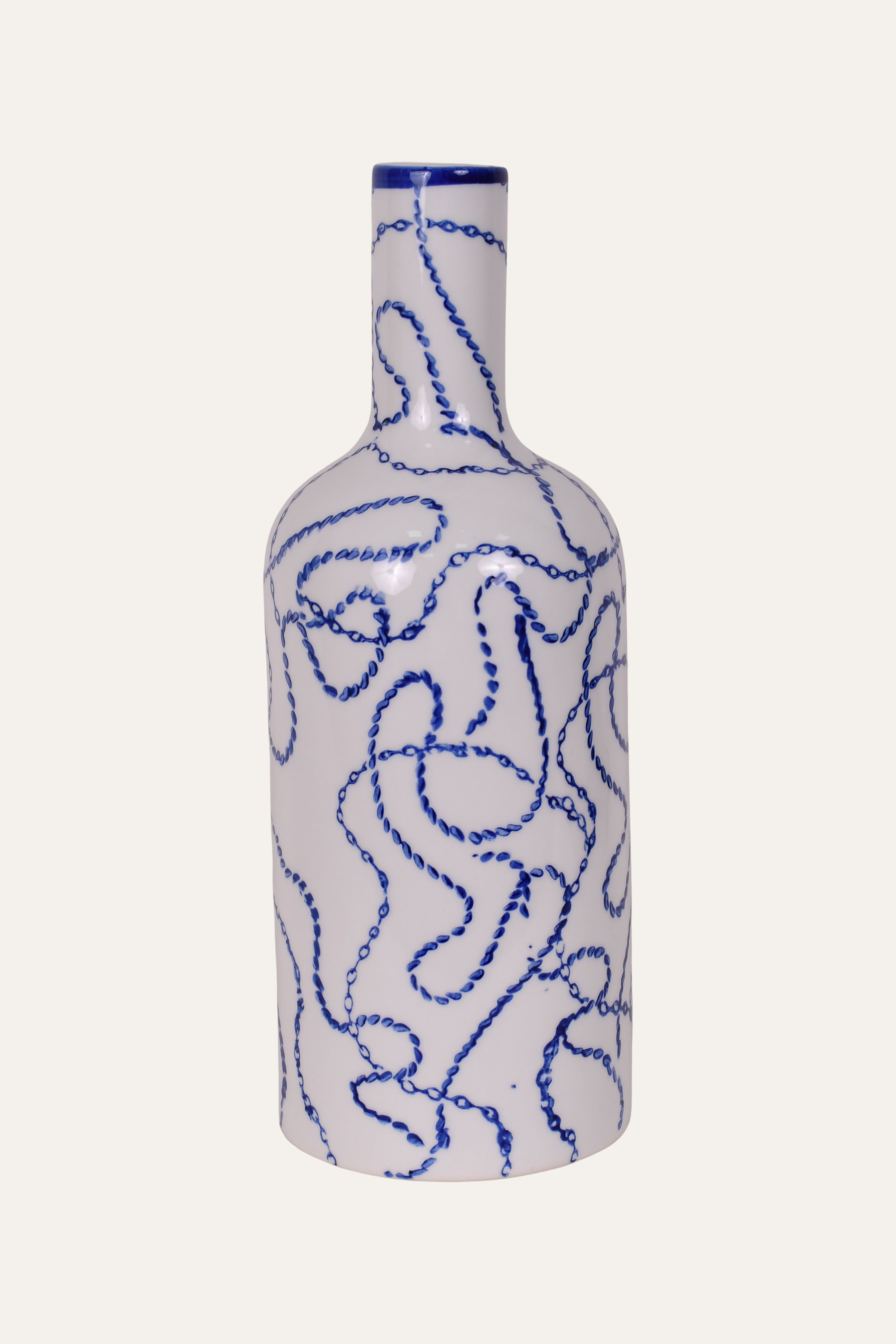 Decorative bottle with blue abstract patterns