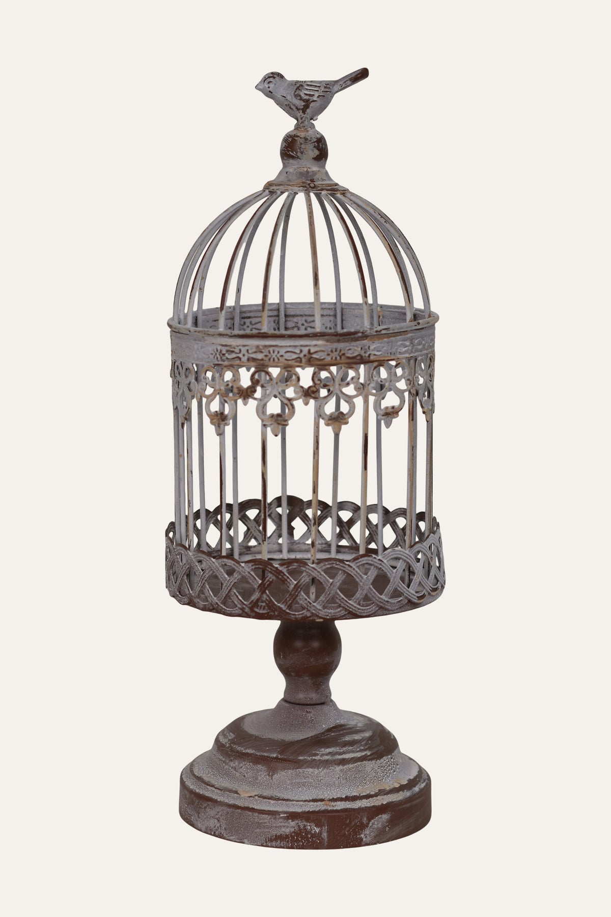 birdcage with a rustic finish