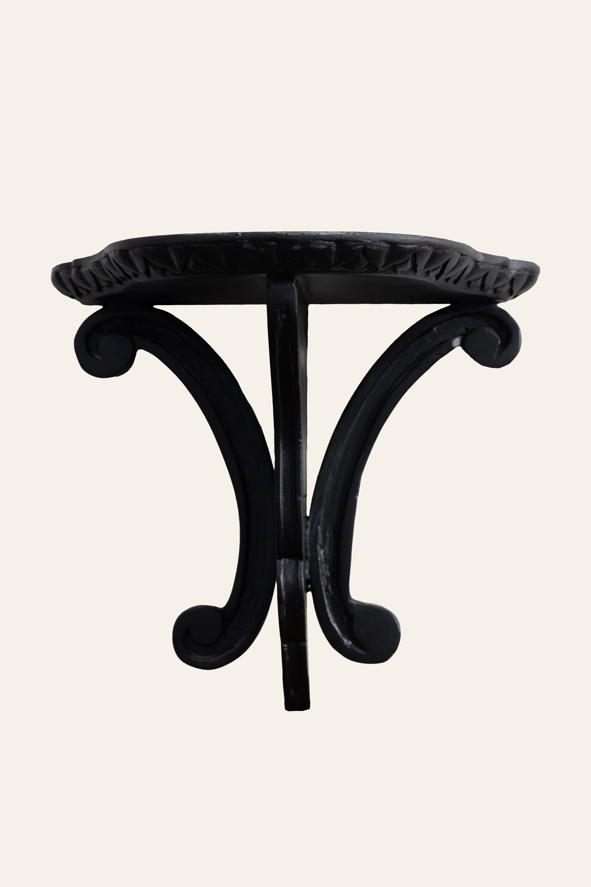 black carved wooden corbel